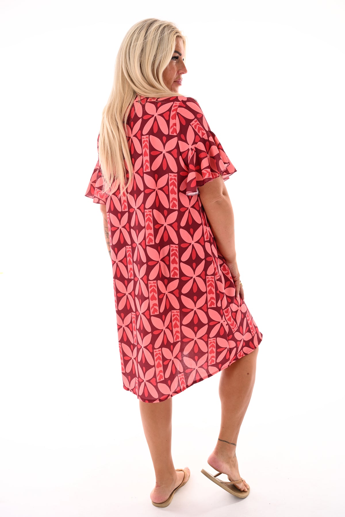 Jurk v-hals korte roezelmouwen print bloemen lichtroze