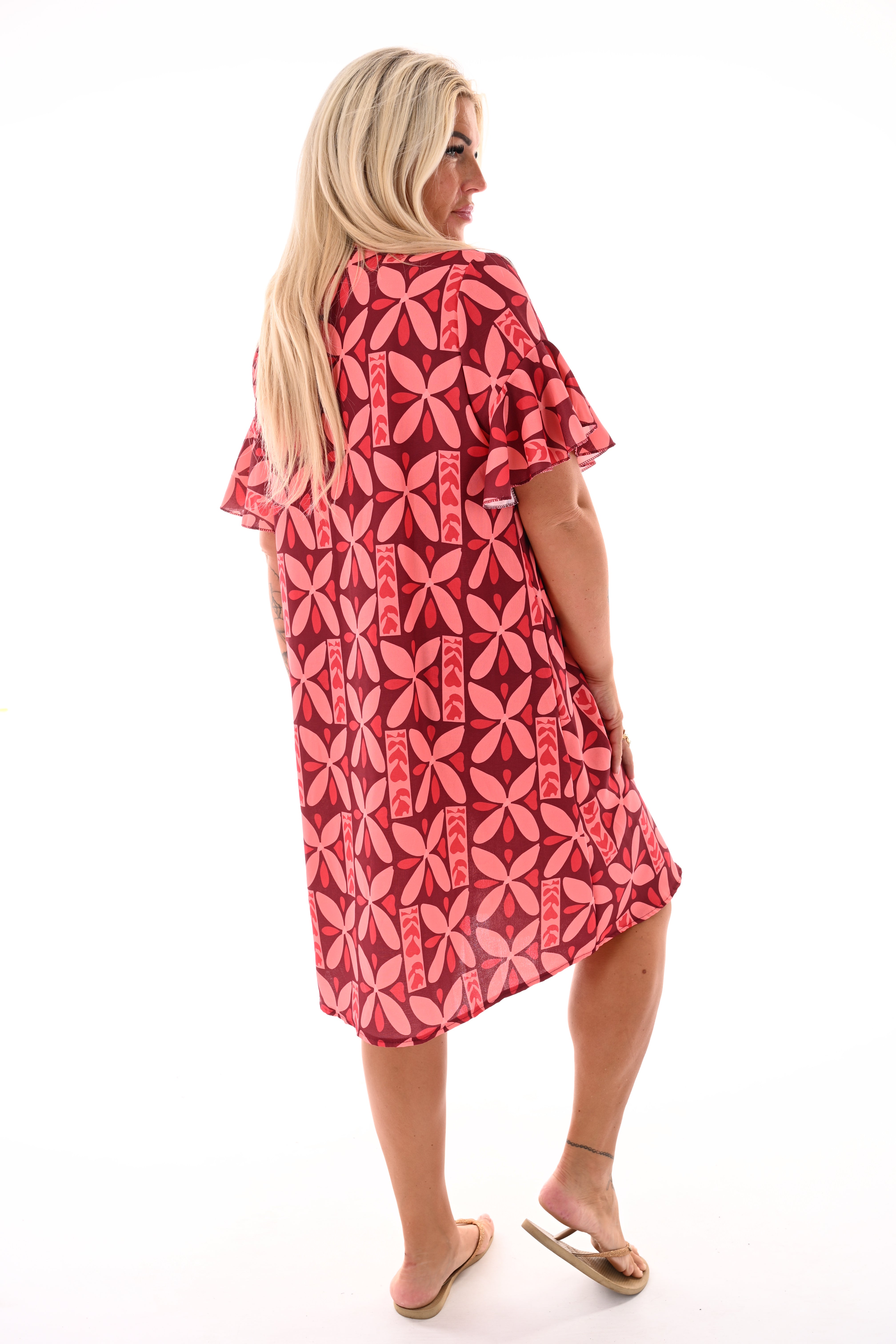 Jurk v-hals korte roezelmouwen print bloemen lichtroze
