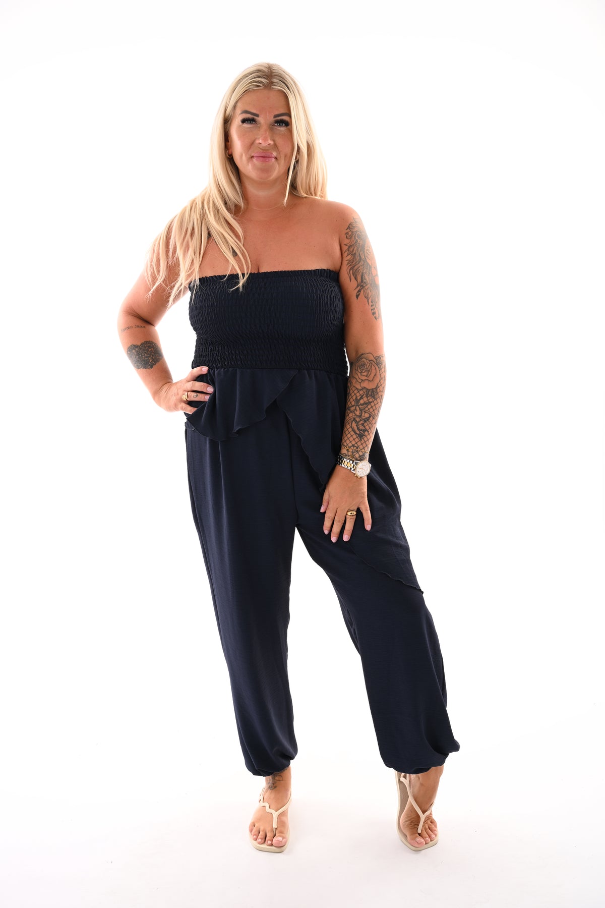 Strapless jumpsuit ruffle marineblauw