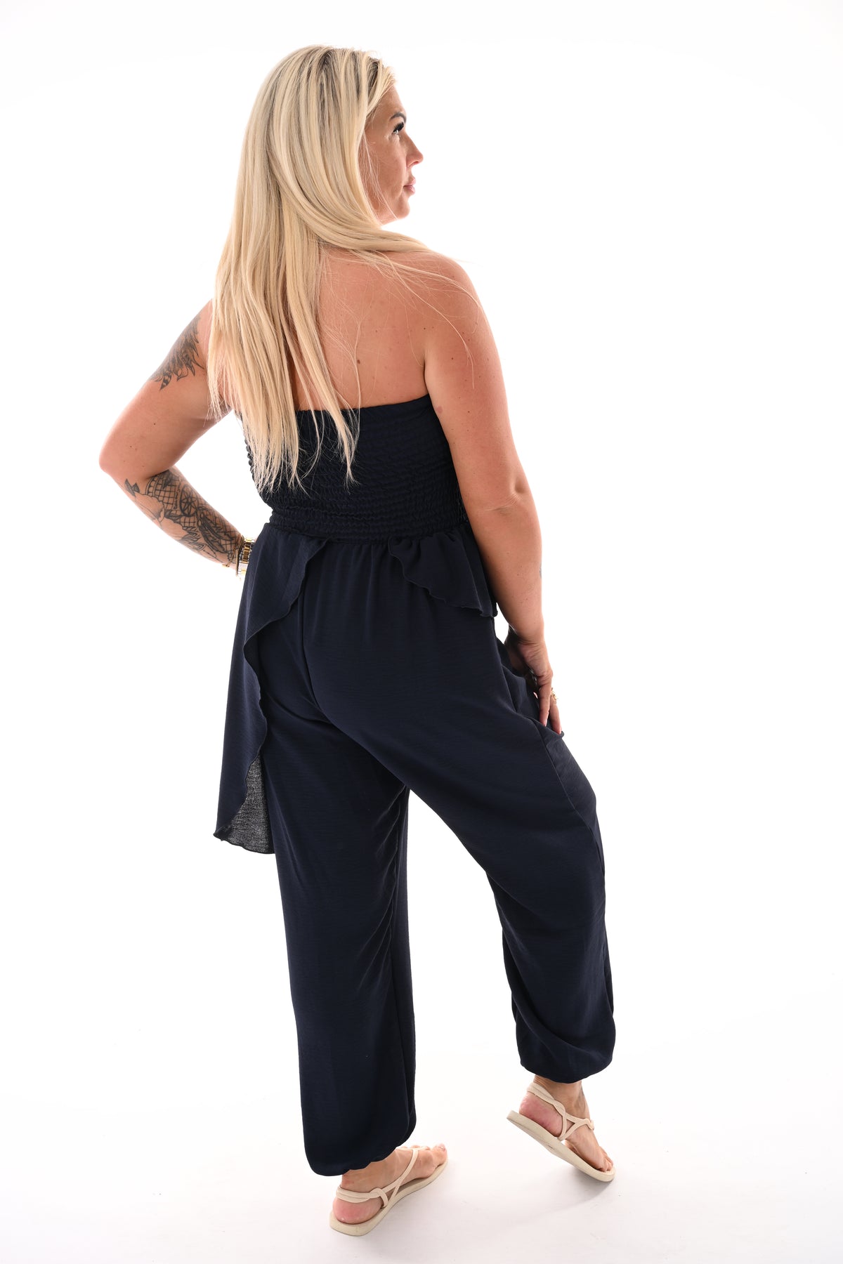 Strapless jumpsuit ruffle marineblauw