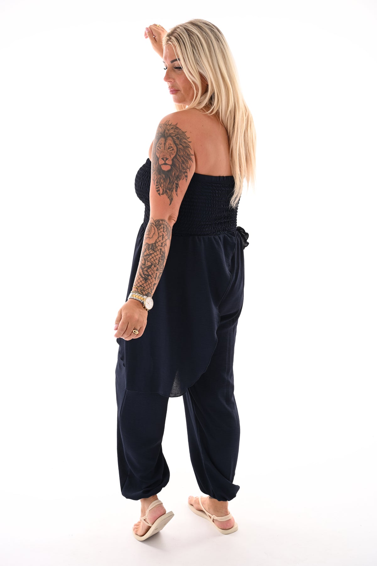 Strapless jumpsuit ruffle marineblauw