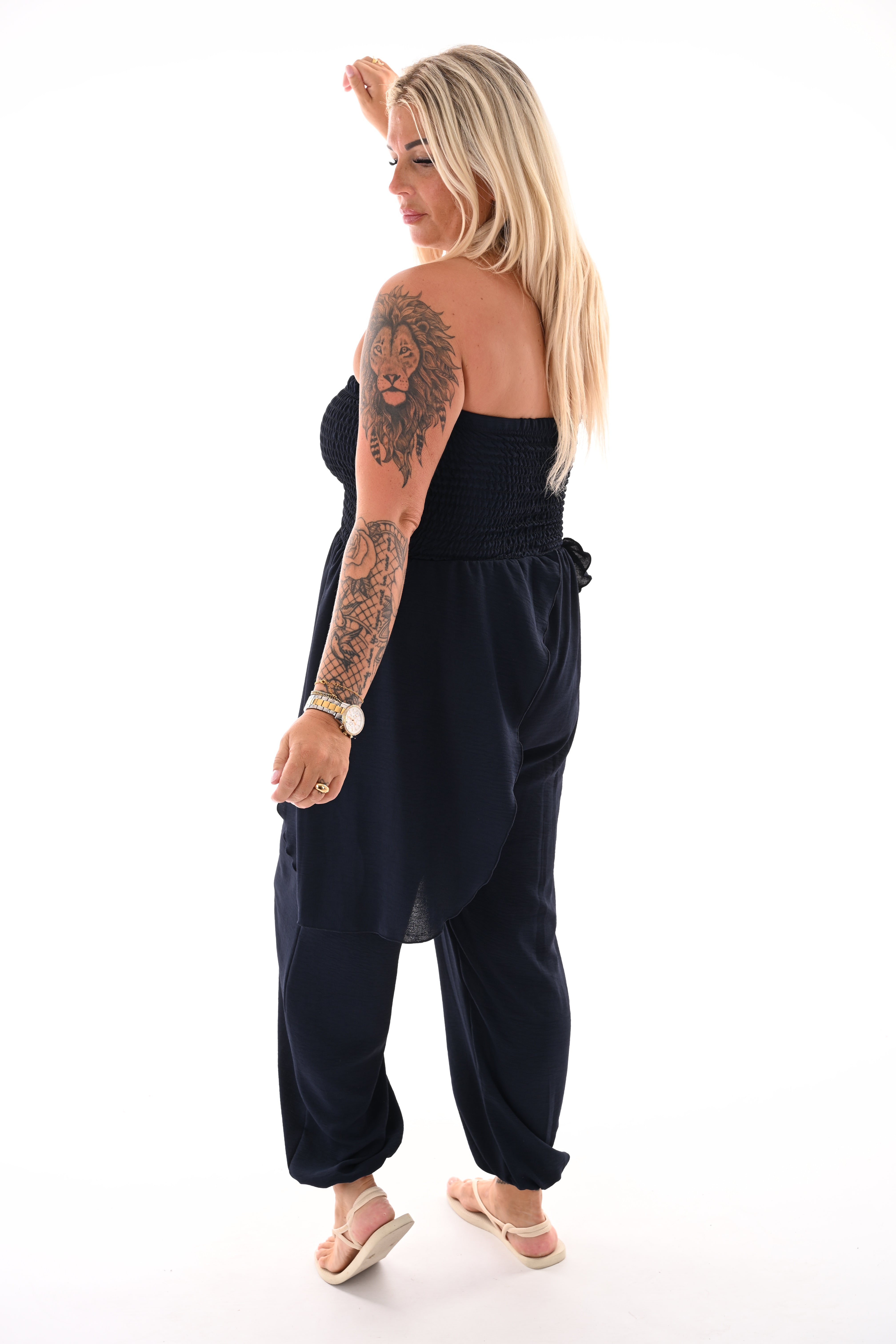 Strapless jumpsuit ruffle marineblauw