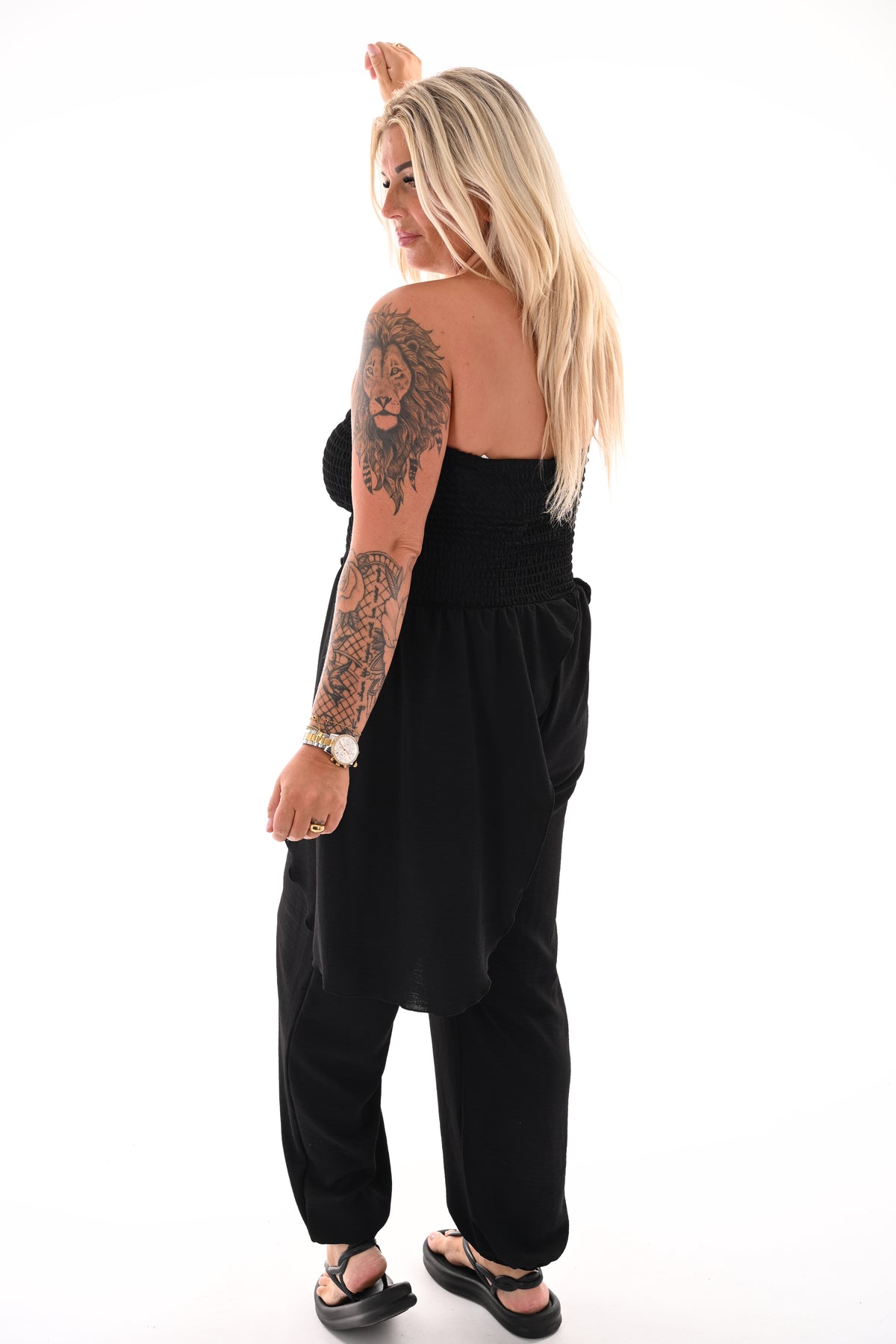 Strapless jumpsuit ruffle zwart