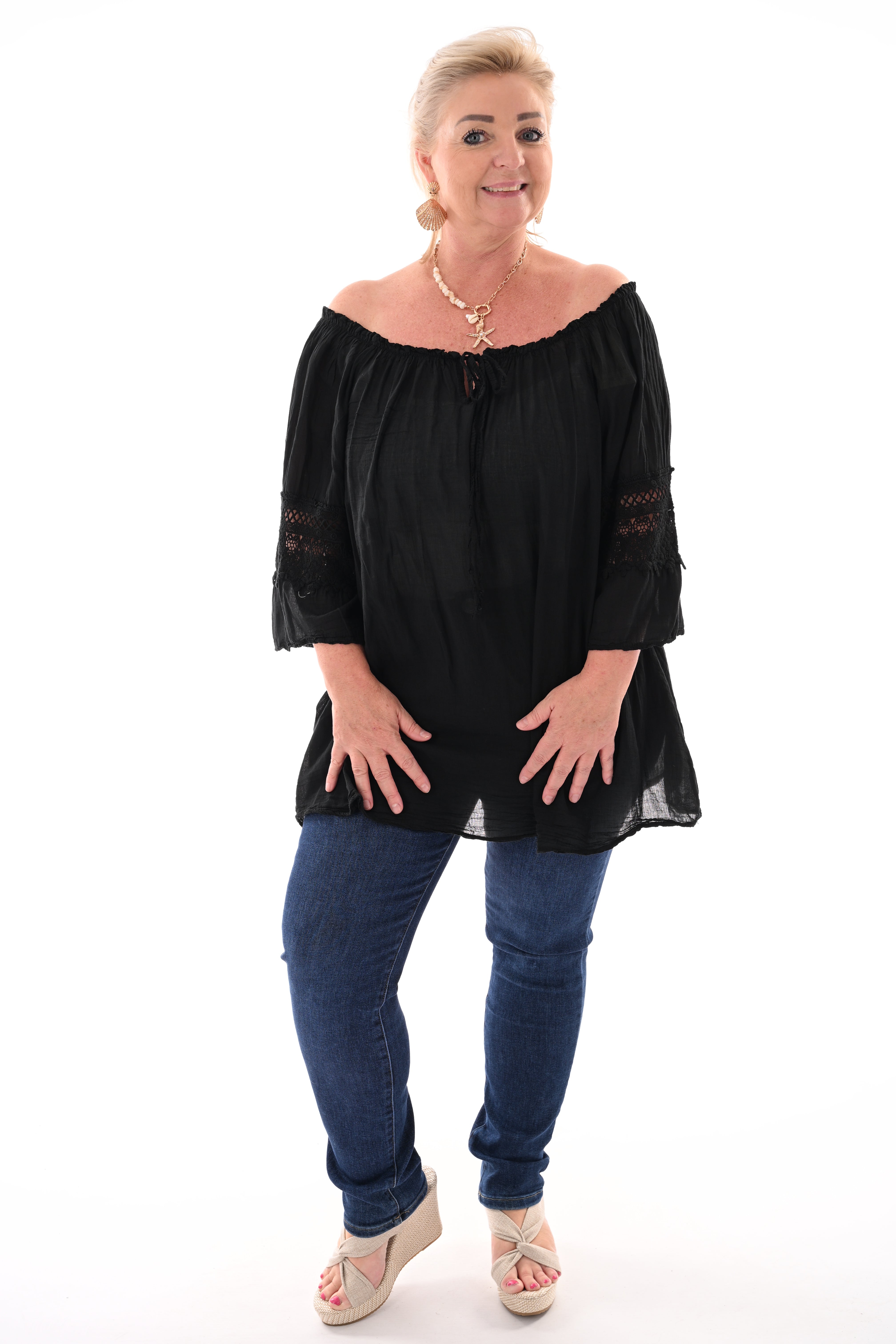 Top off-shoulder broderie zwart