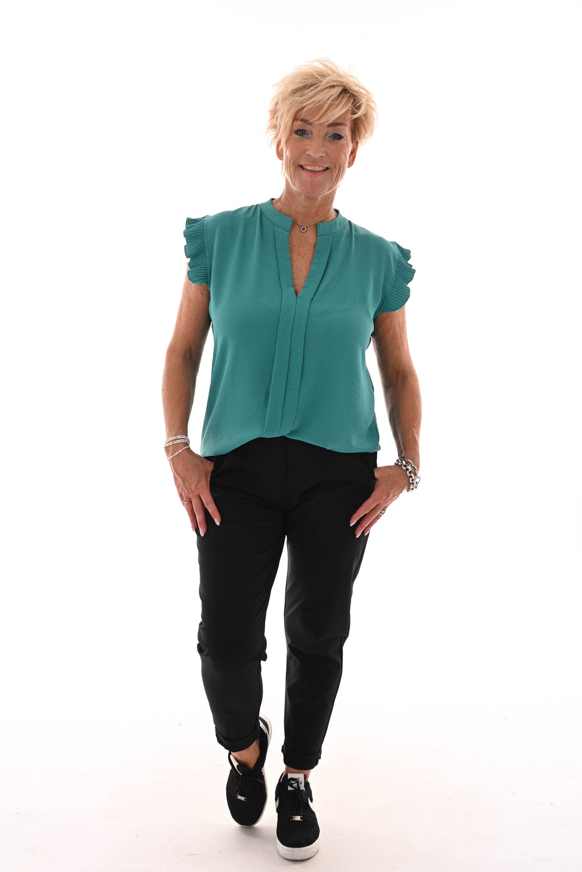 Top v-hals korte plisse mouwen turquoise