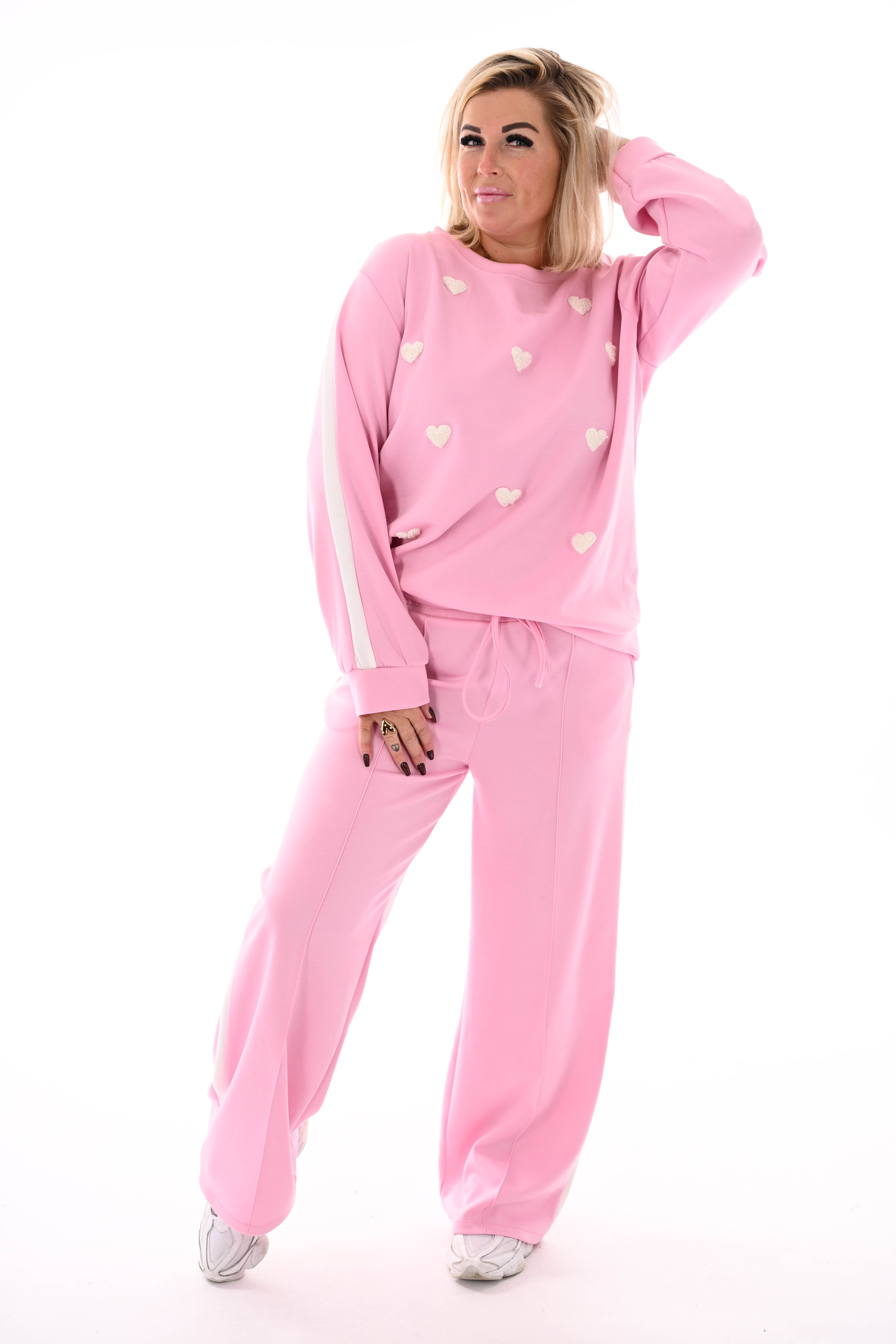 Tweedelig joggingspak met hartjes roze