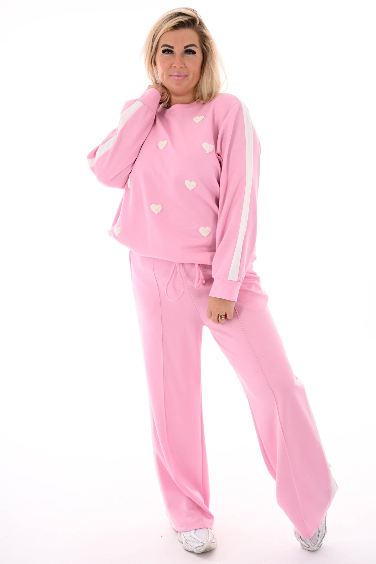 Tweedelig joggingspak met hartjes roze