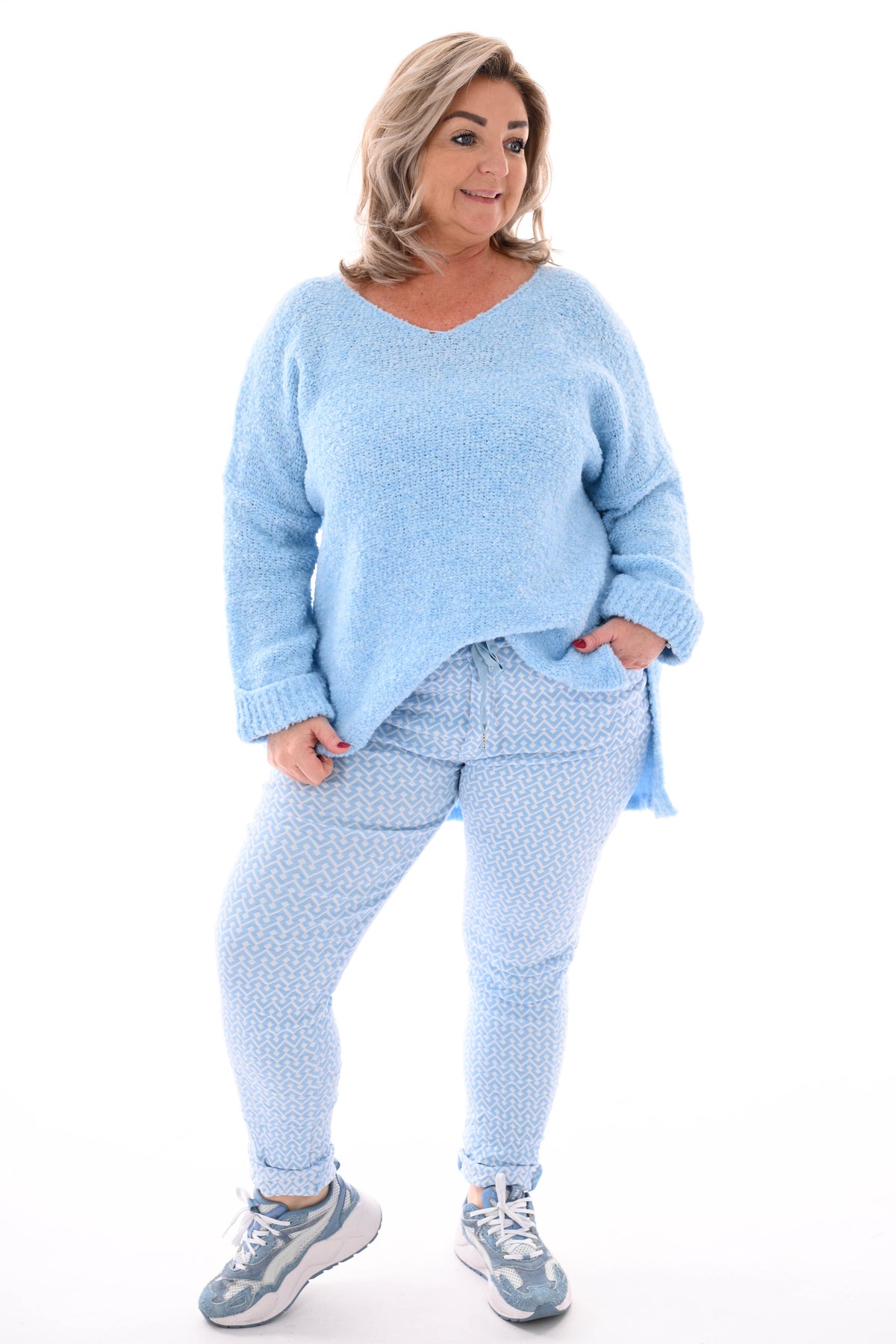 Stretchbroek geometrisch pijlprint lichtblauw