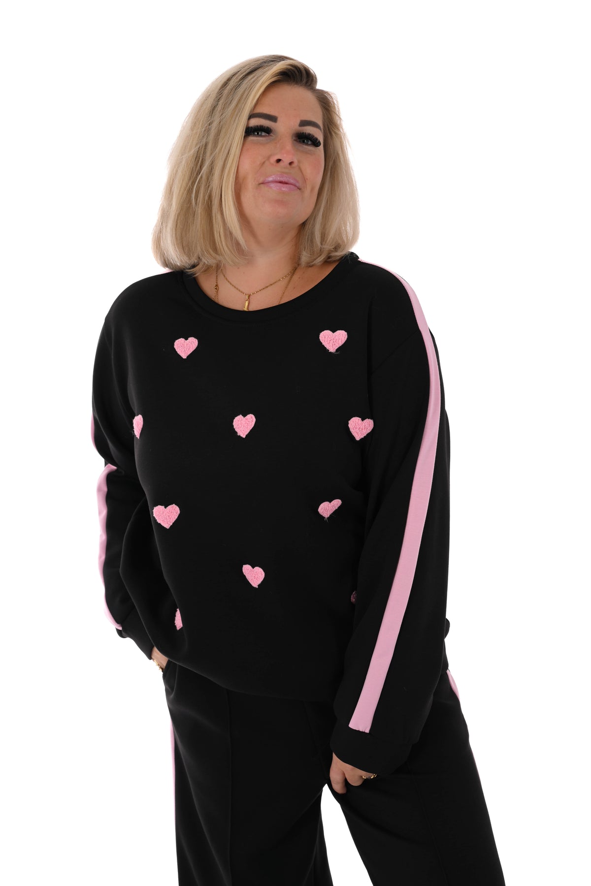 Tweedelig joggingspak met hartjes zwart