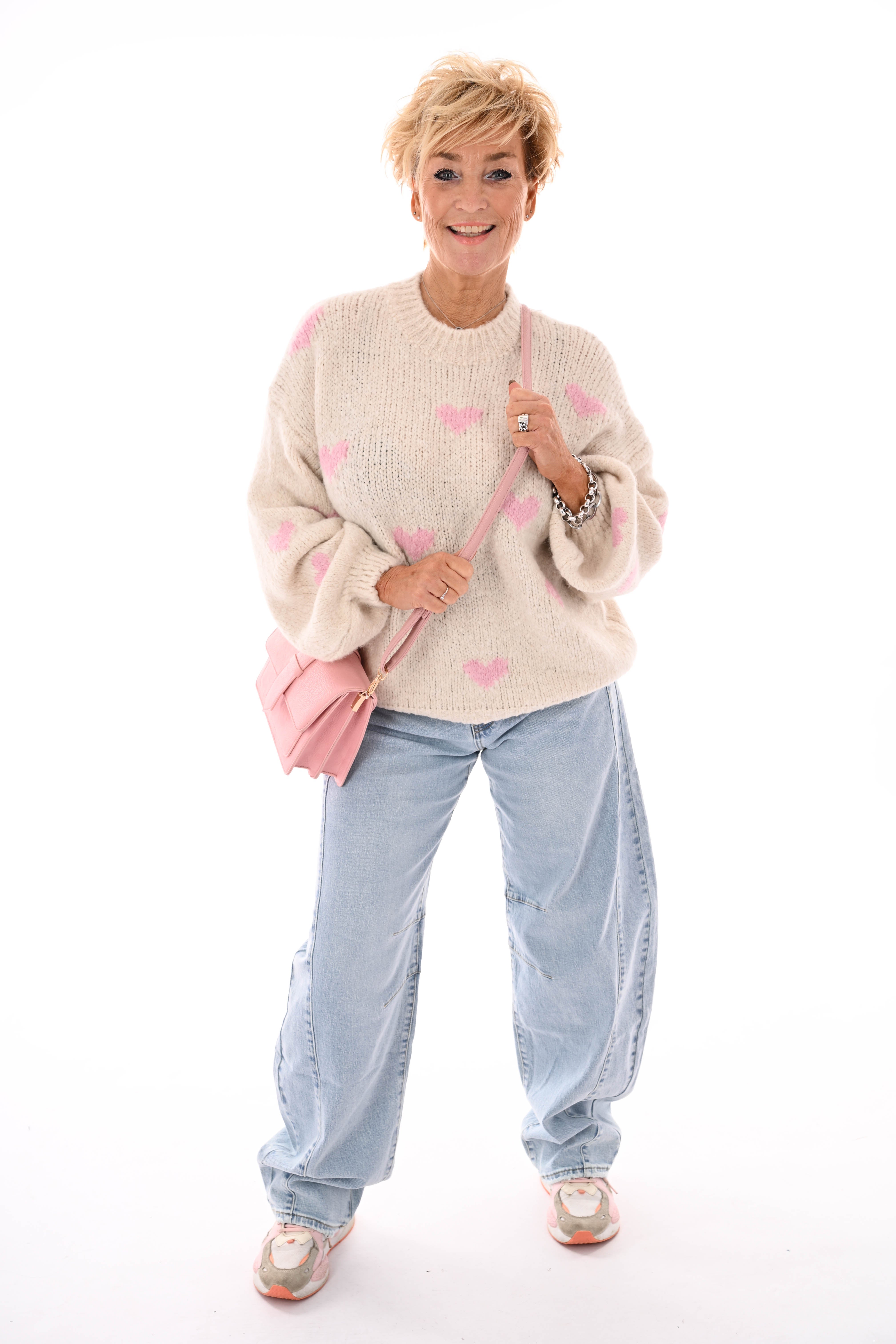 Gebreide trui kleine hartjes beige