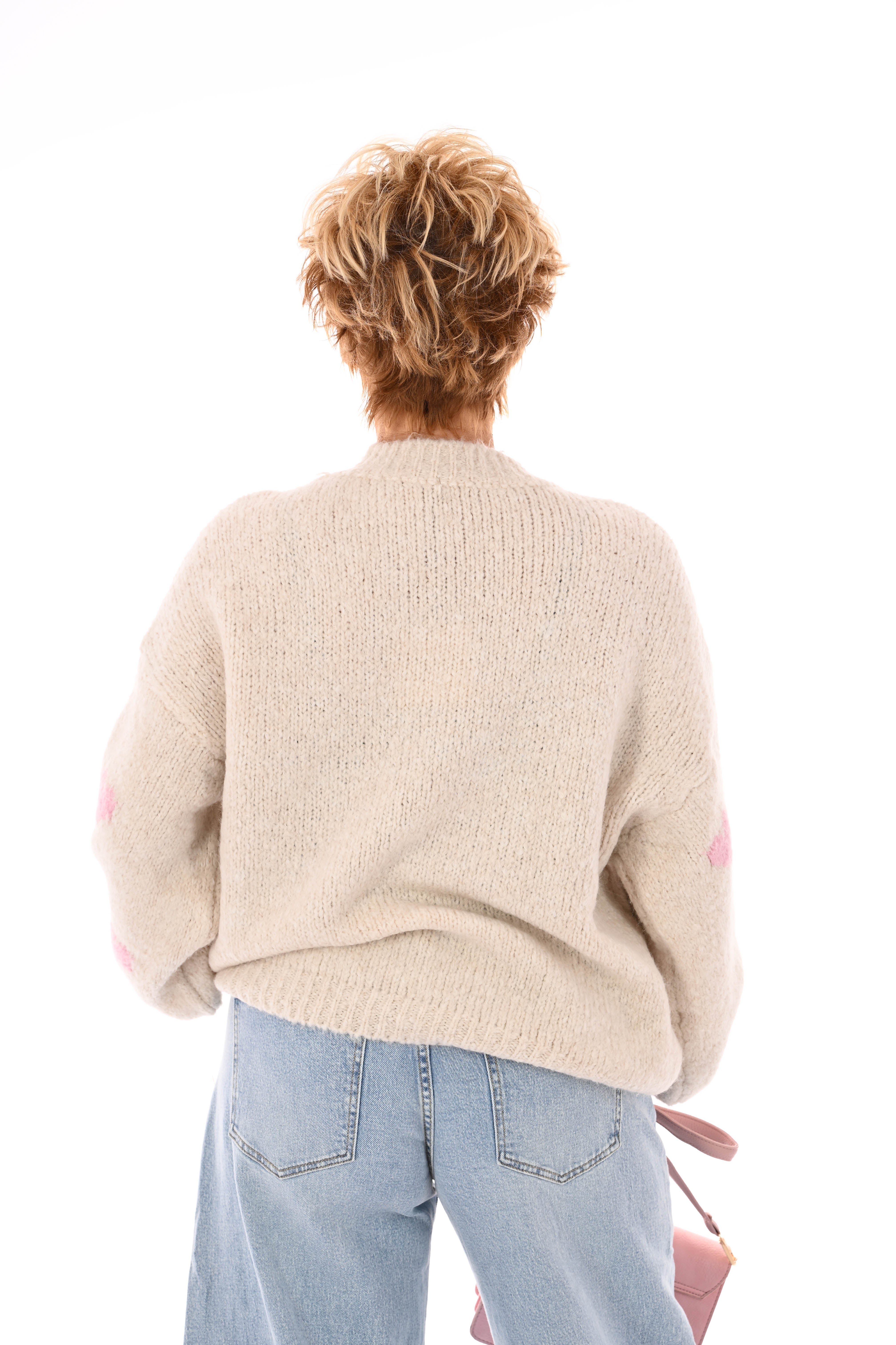 Gebreide trui kleine hartjes beige