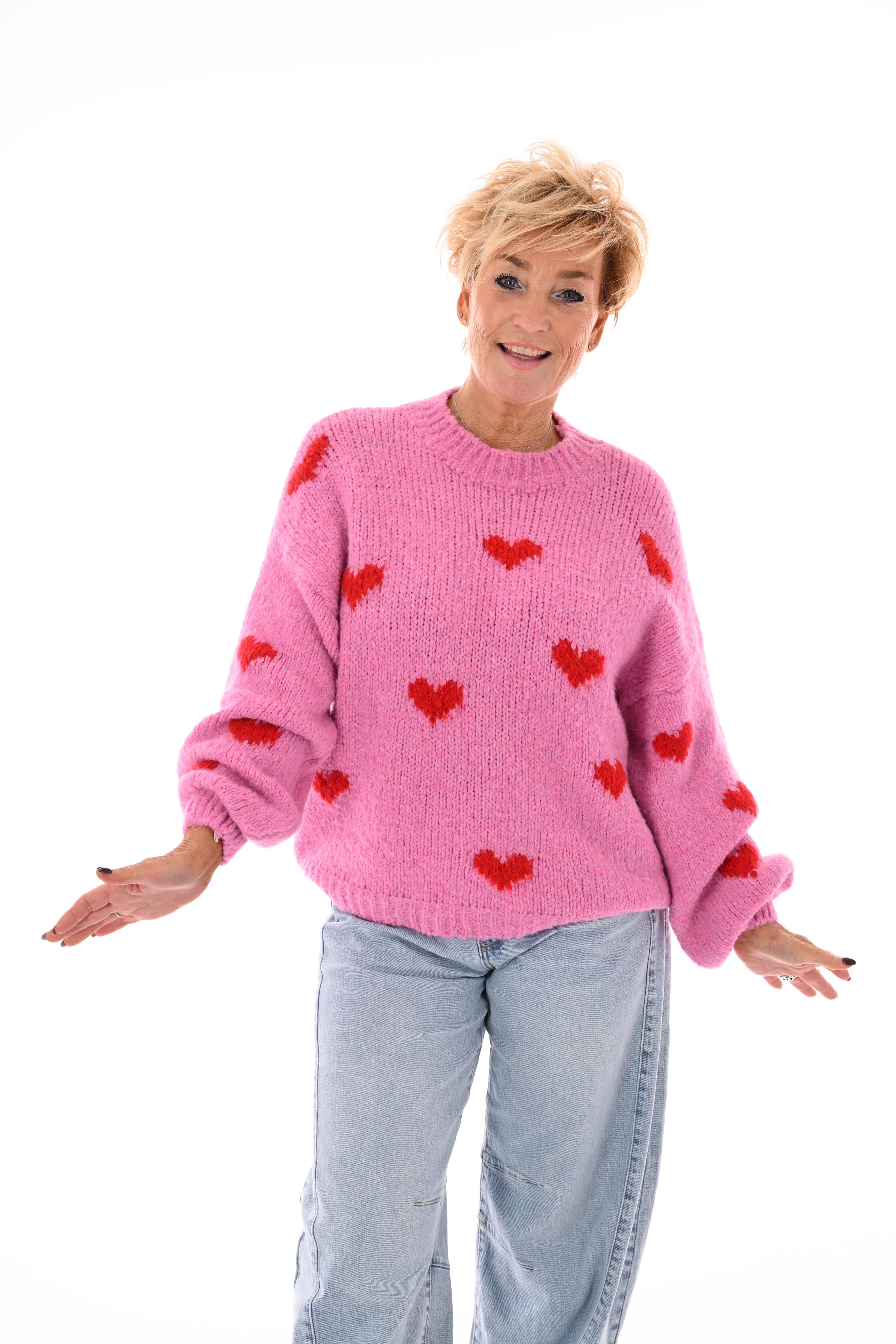 Gebreide trui kleine hartjes roze