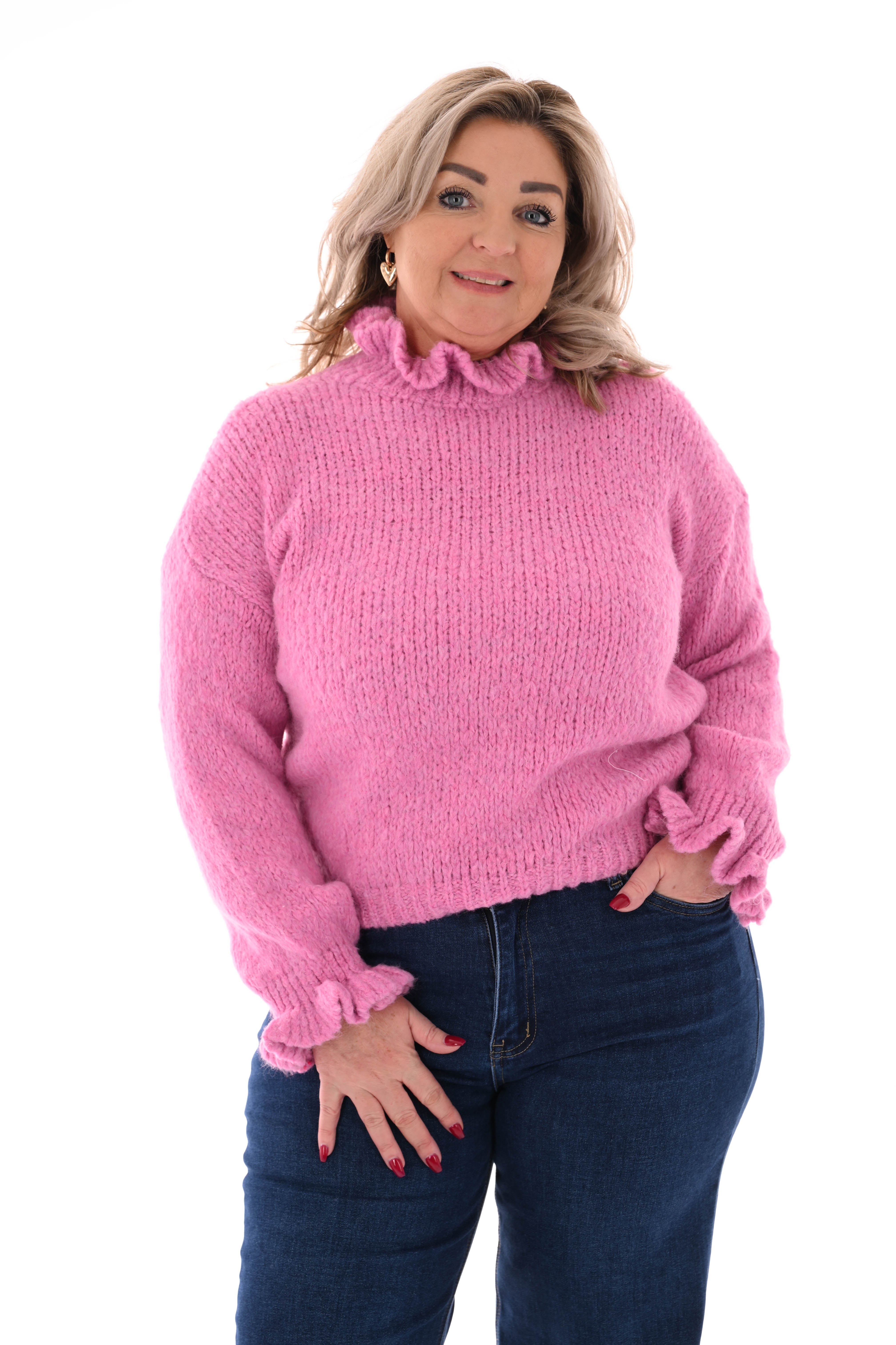 Gebreide trui roezelkraag en mouwen roze