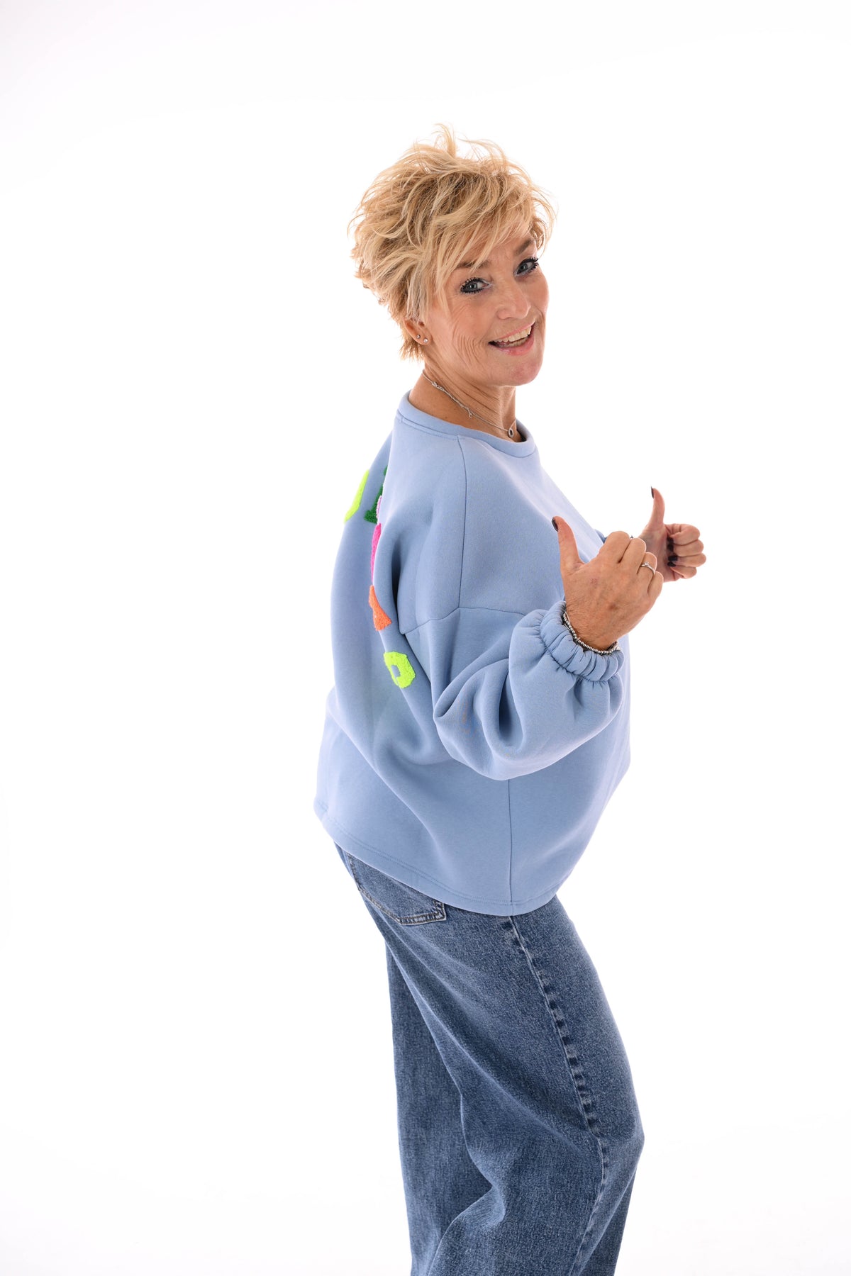 Sweater good vibes lichtblauw