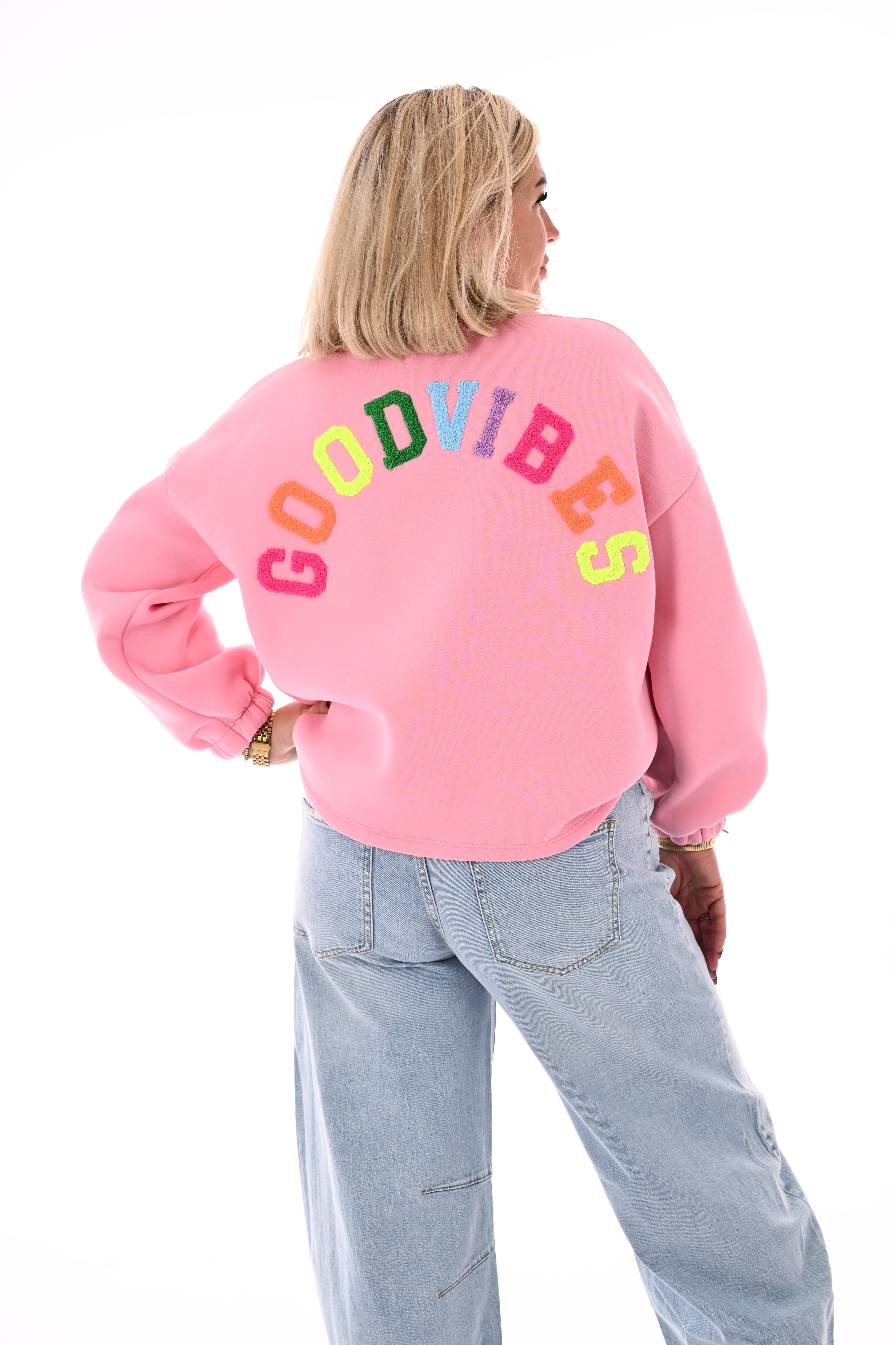 Sweater good vibes lichtroze