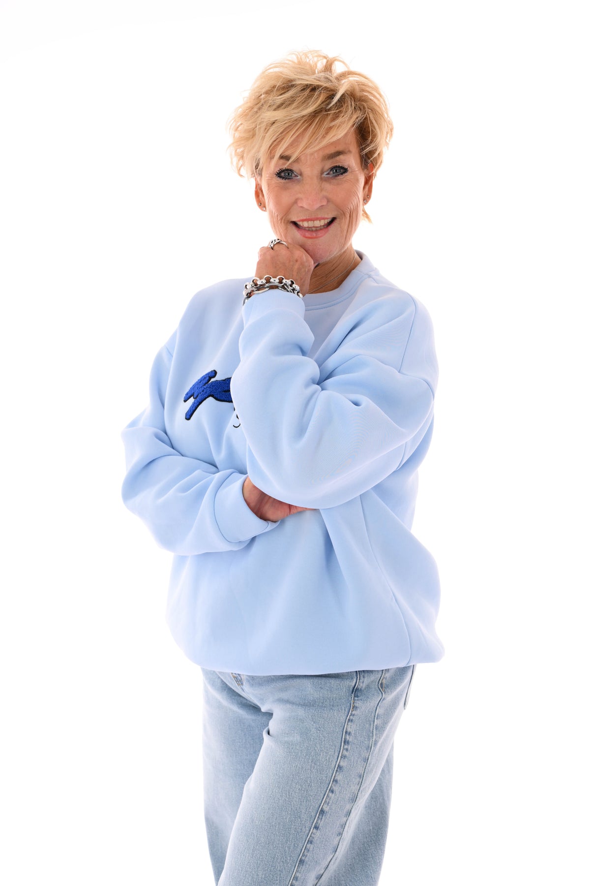 Sweater apres skiclub lichtblauw