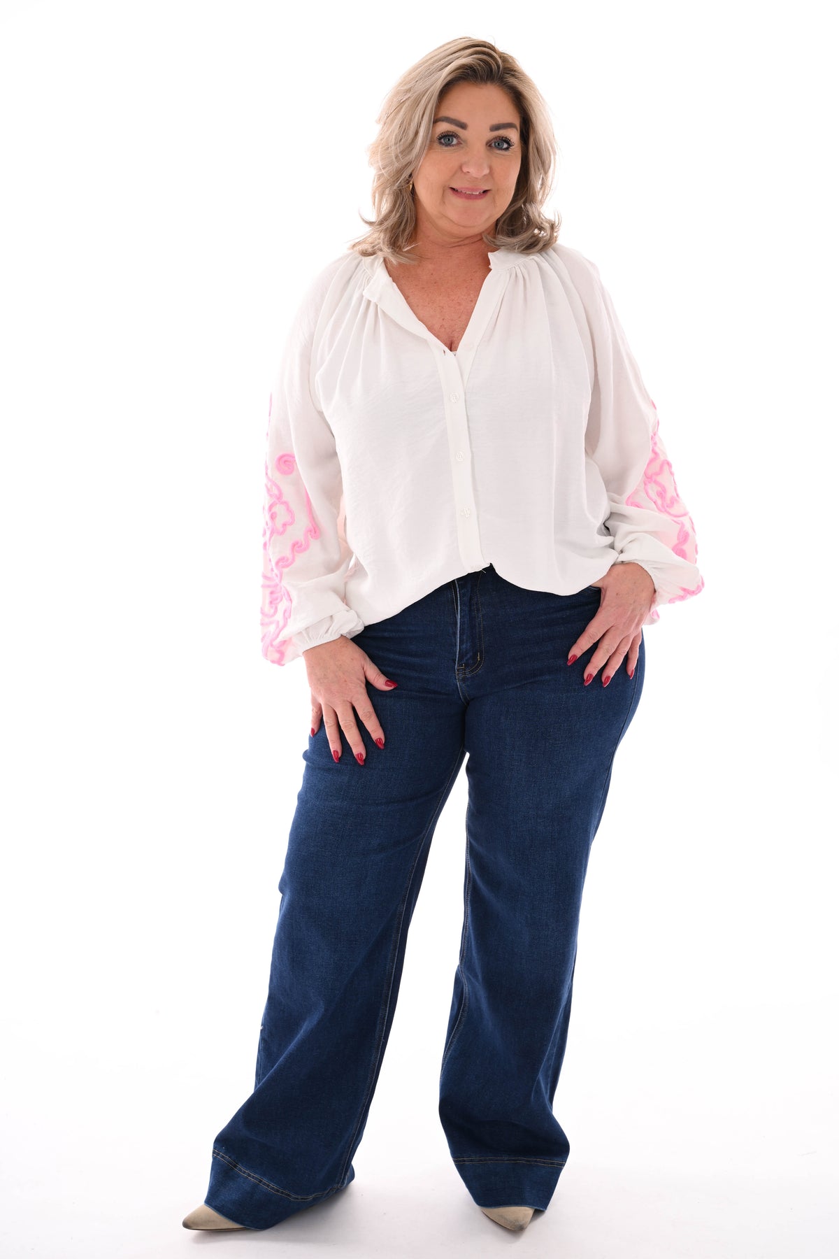 Blouse mouwen met borduursels wit