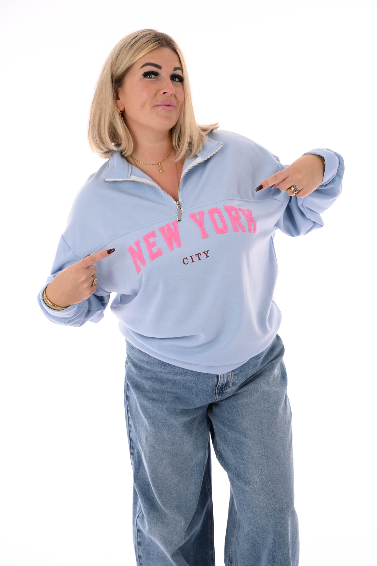 Sweater new york met rits lichtblauw