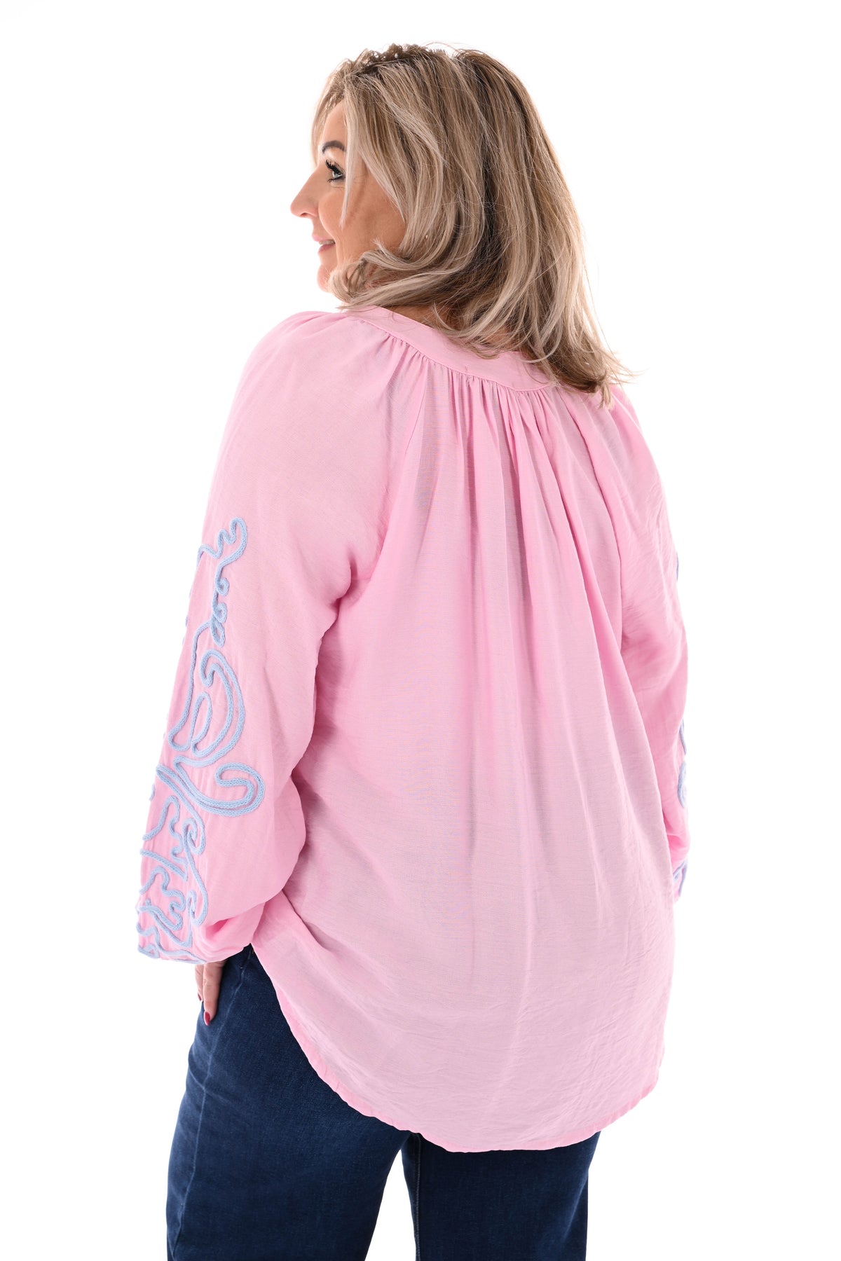 Blouse mouwen met borduursels roze