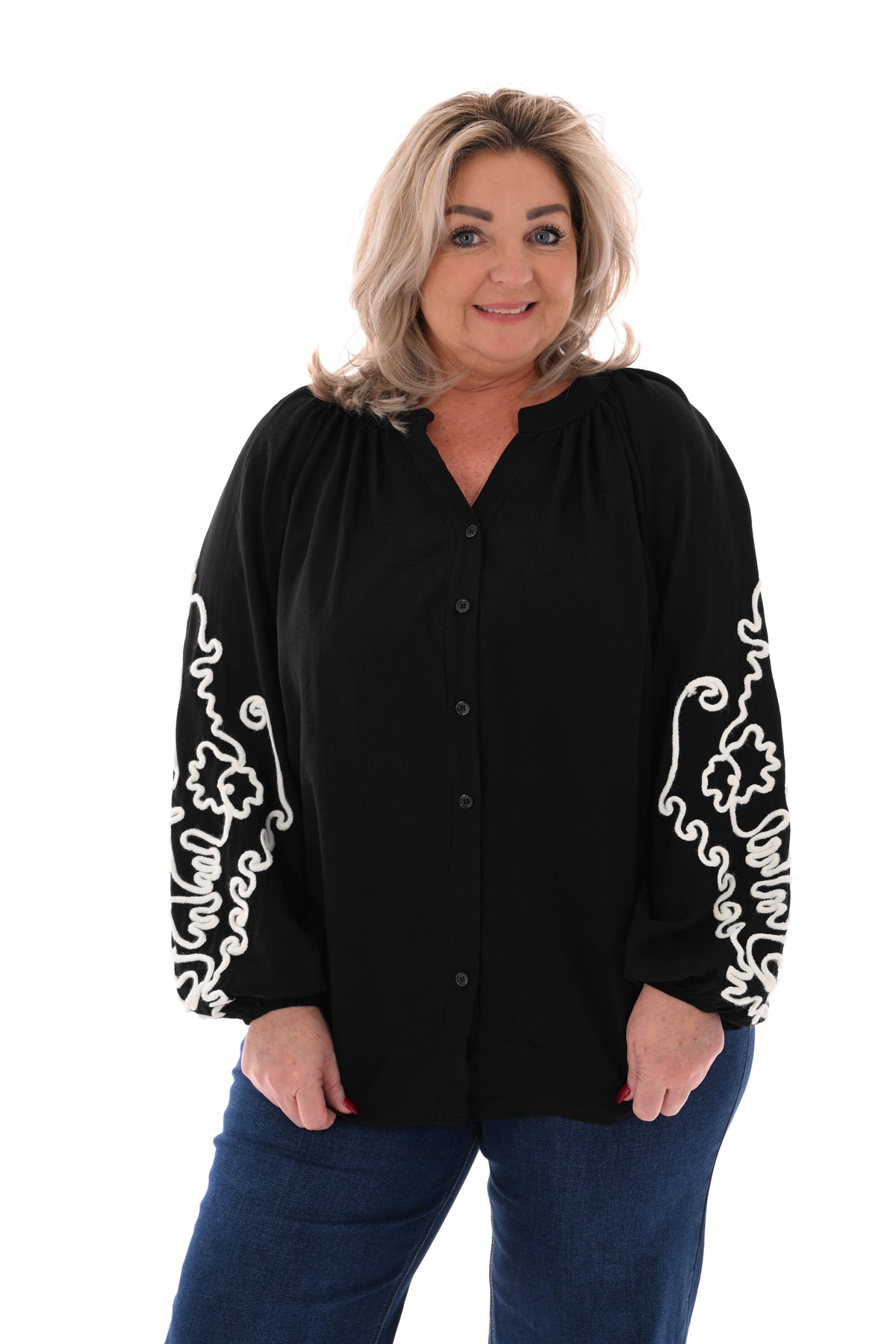 Blouse mouwen met borduursels zwart
