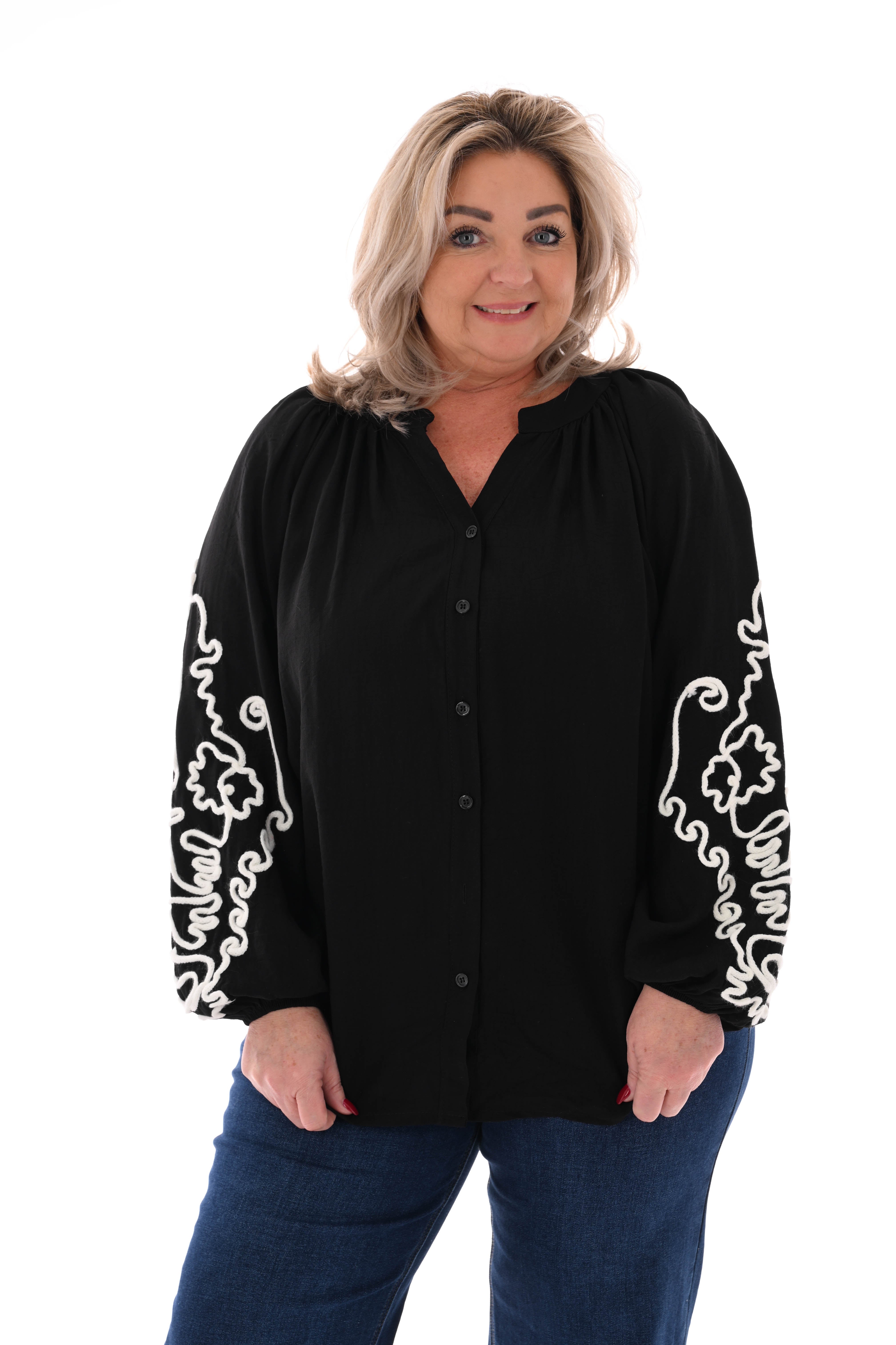Blouse mouwen met borduursels zwart