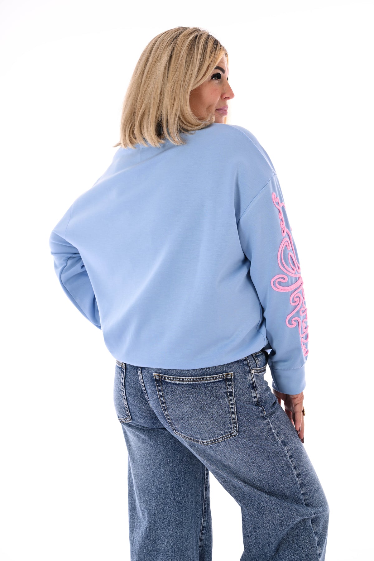 Sweater mouwen met borduursels blauw