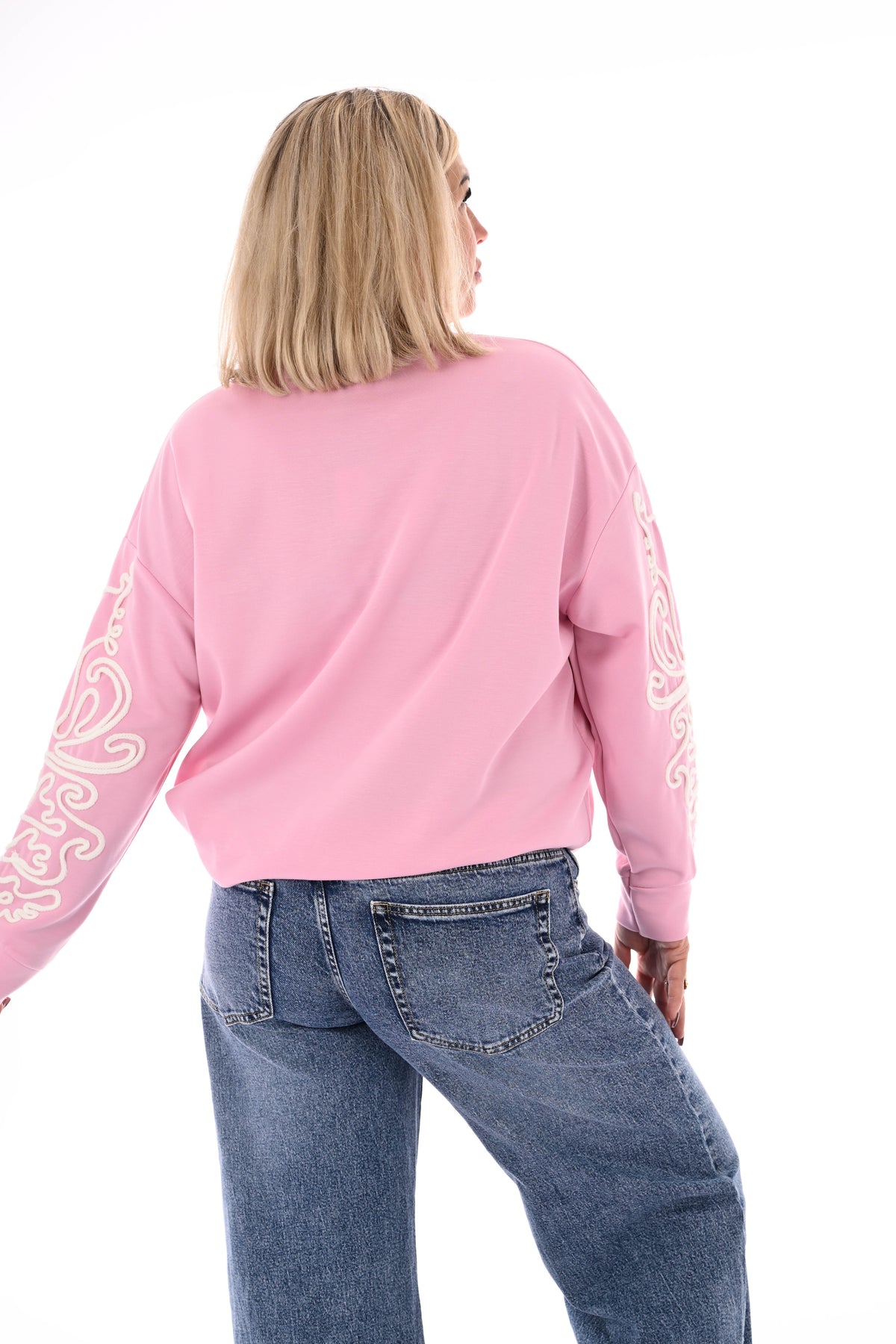 Sweater mouwen met borduursels lichtroze