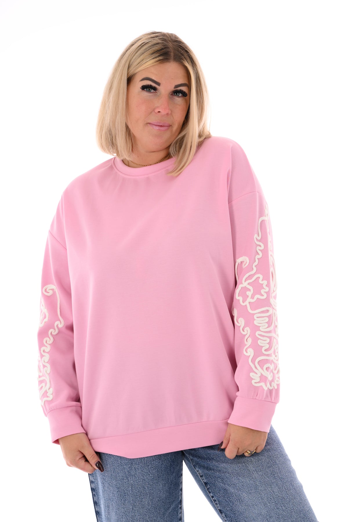 Sweater mouwen met borduursels lichtroze