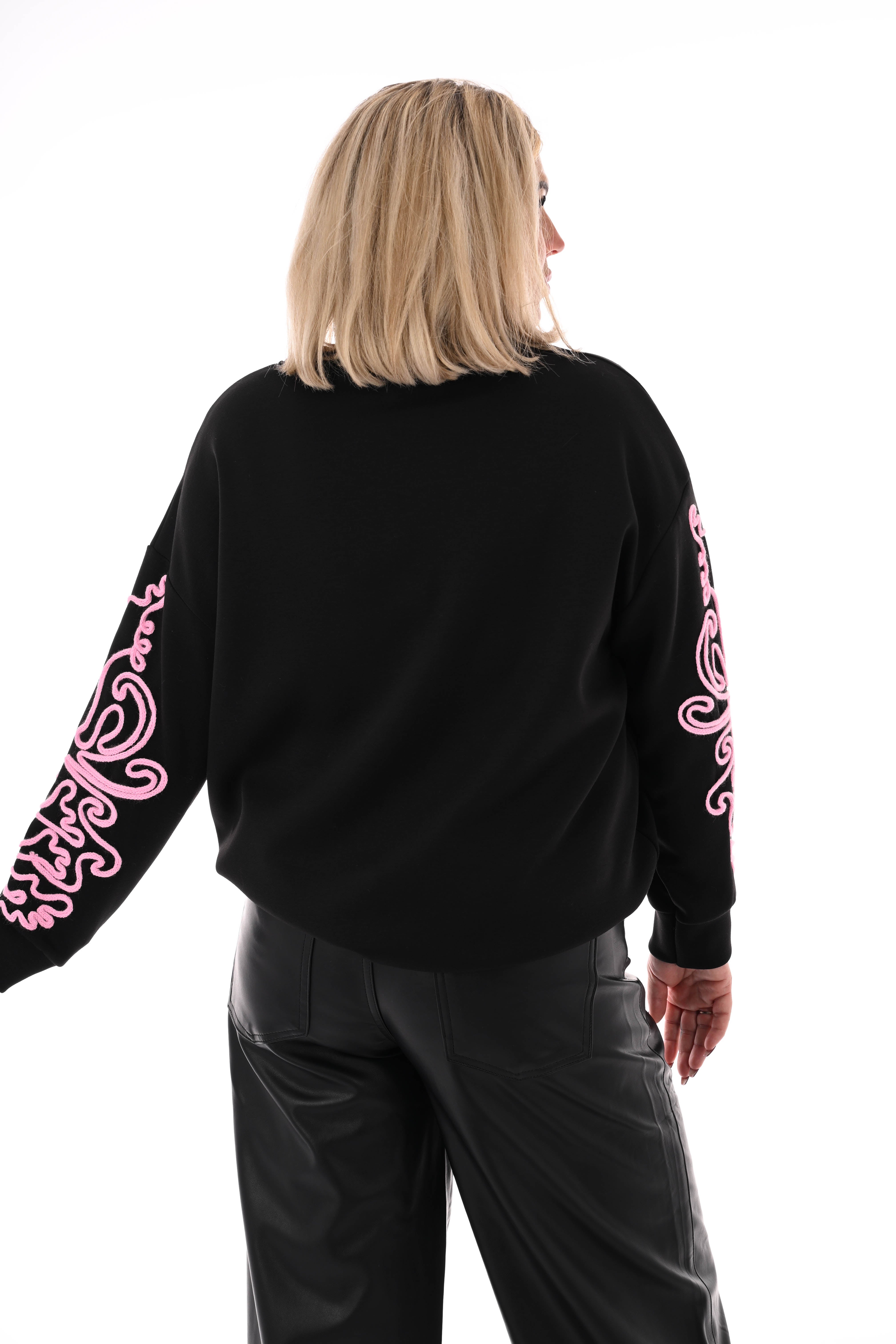 Sweater mouwen met borduursels zwart