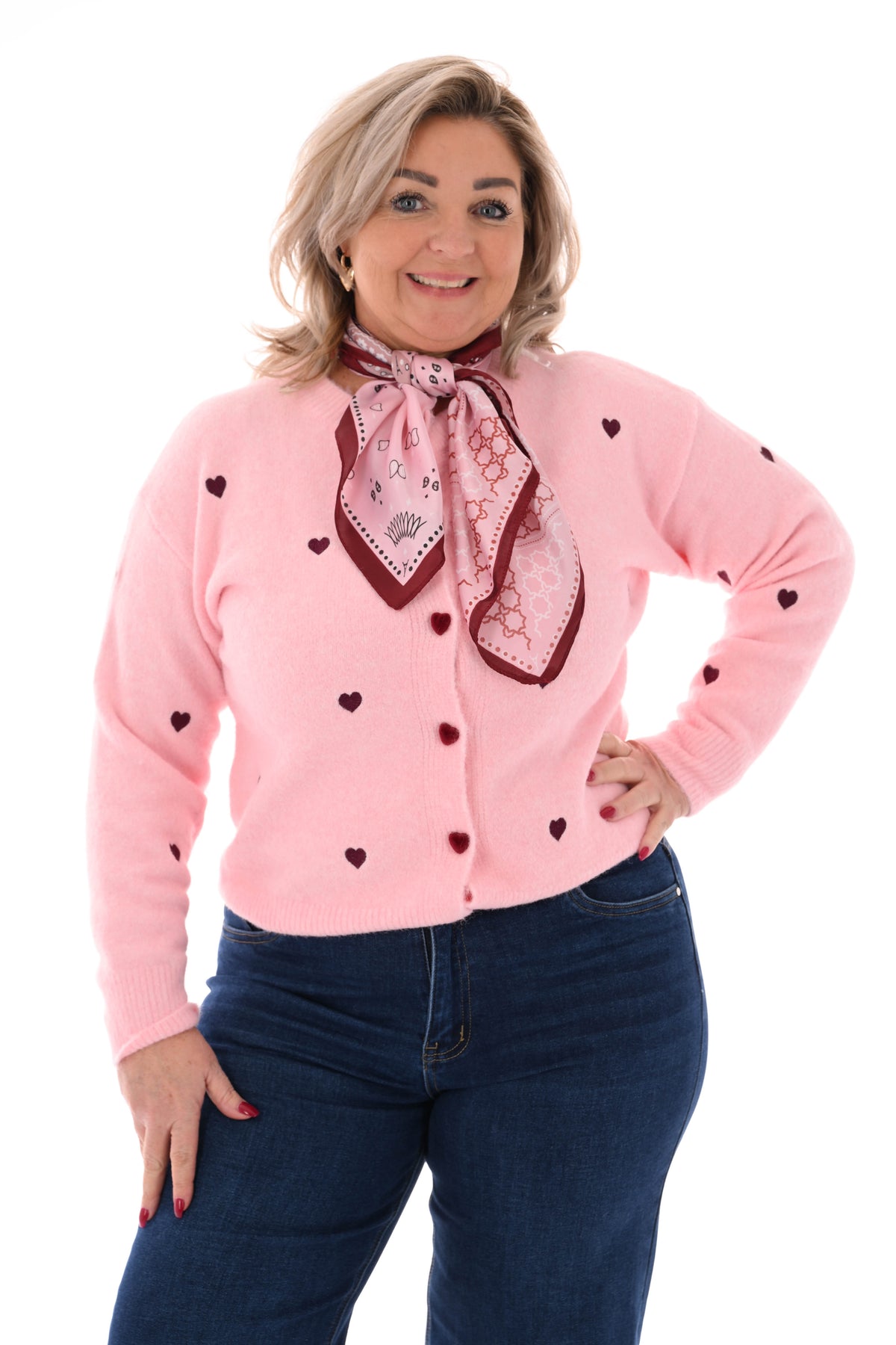 Fijn gebreid vest met hartjes roze