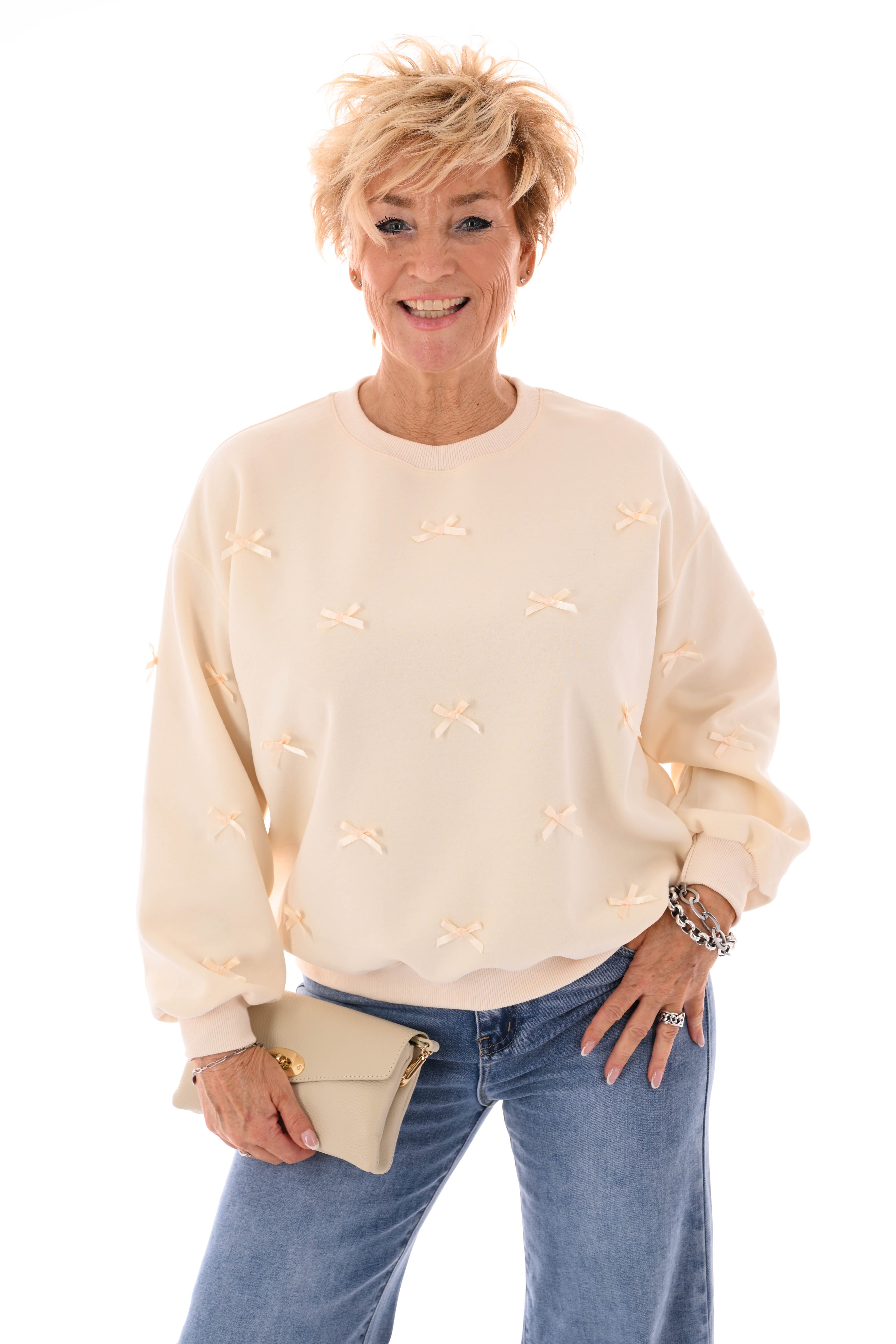 Sweater strikjes creme