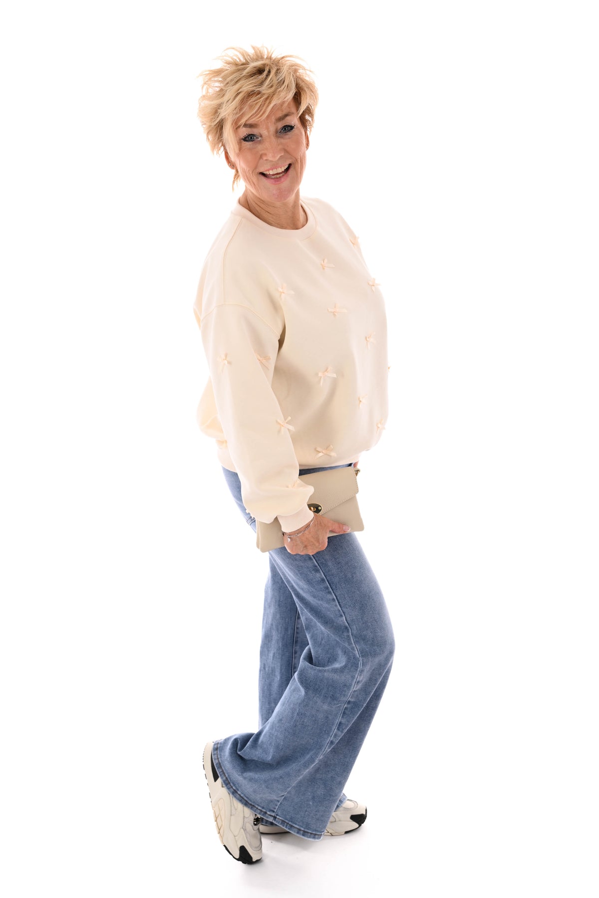 Sweater strikjes creme