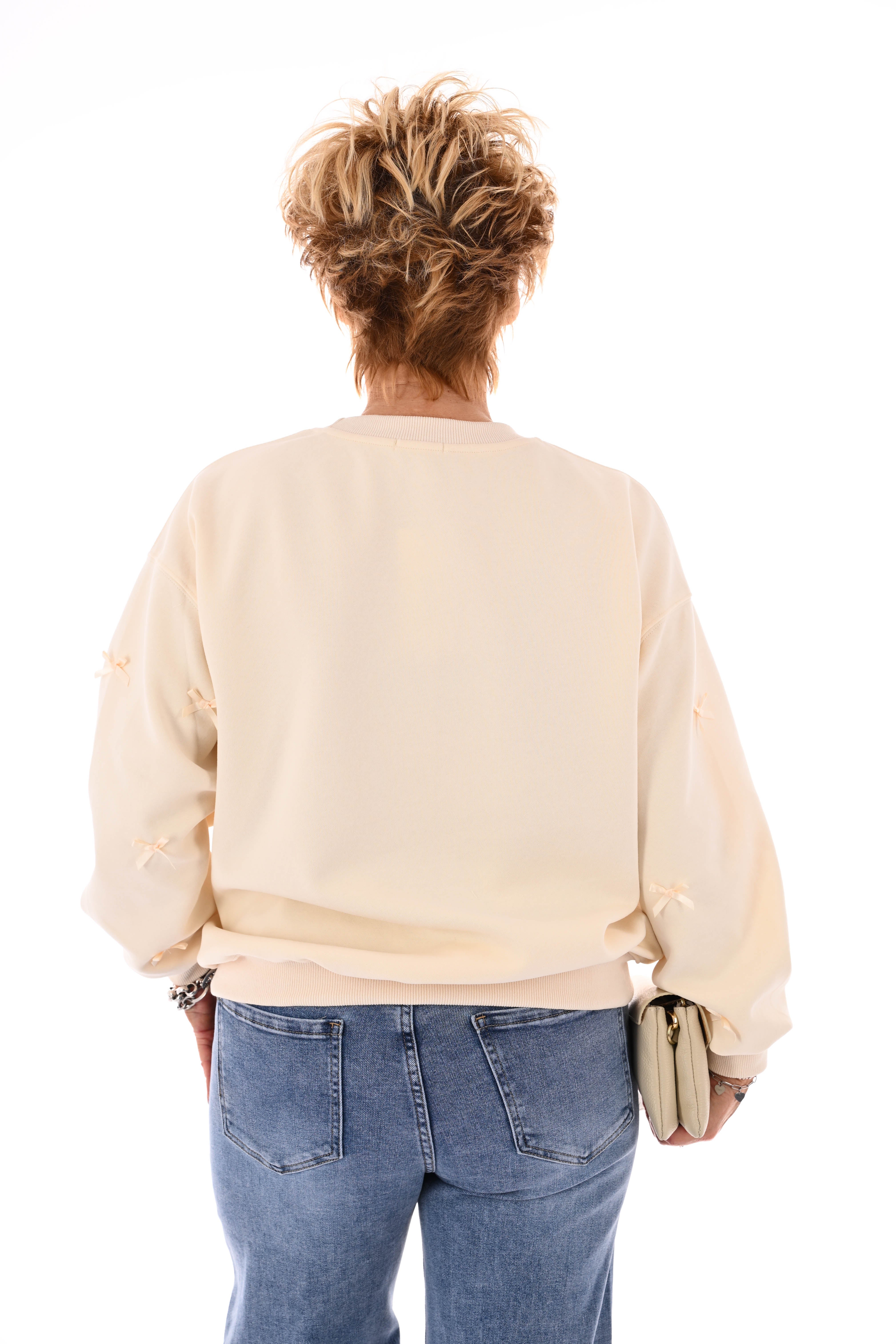 Sweater strikjes creme