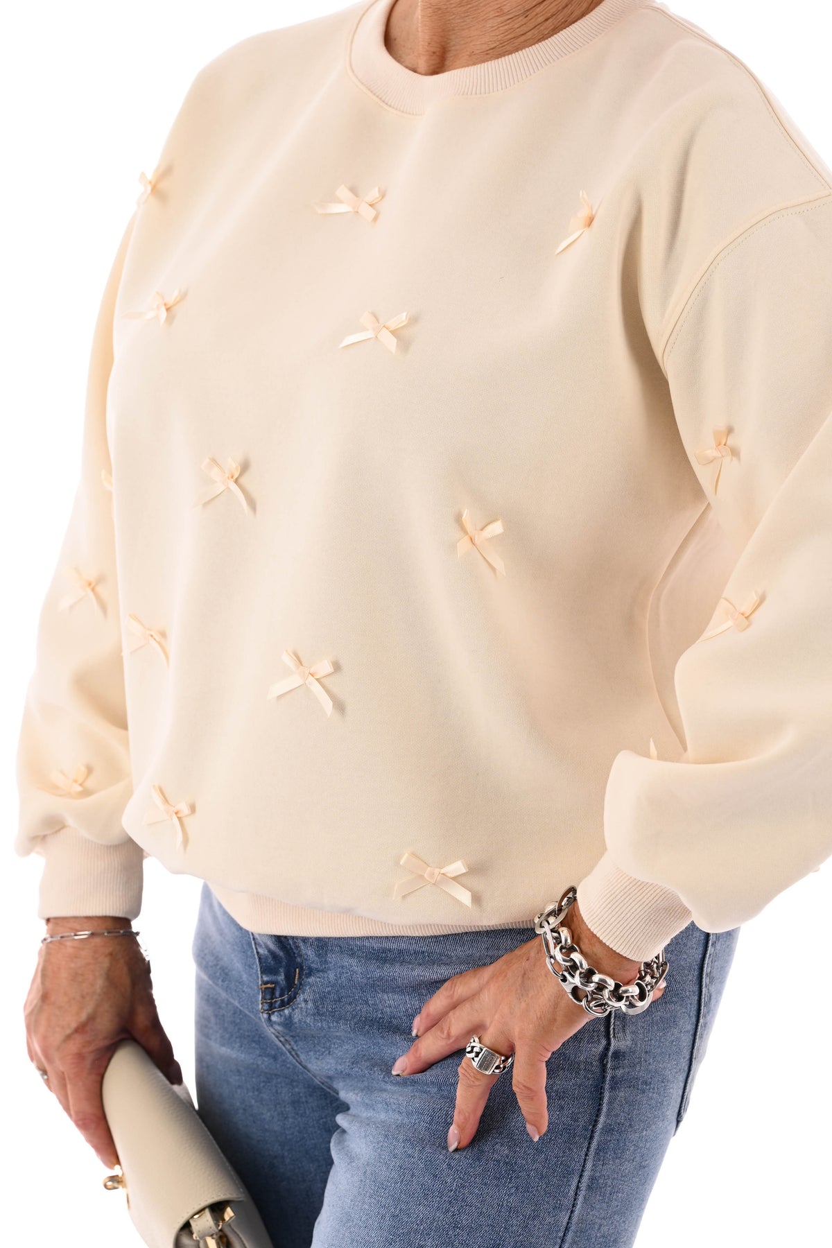 Sweater strikjes creme
