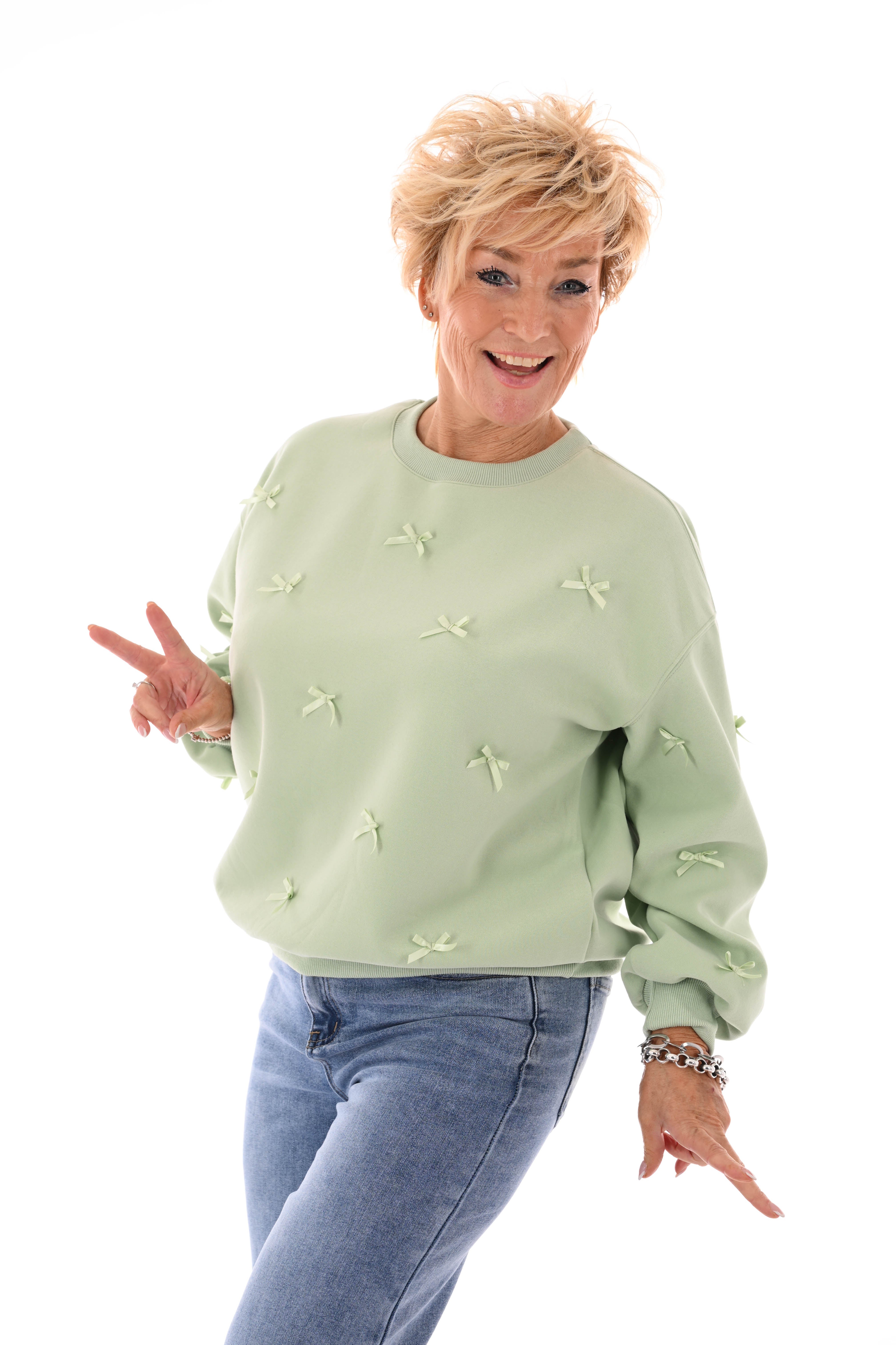 Sweater strikjes pistache