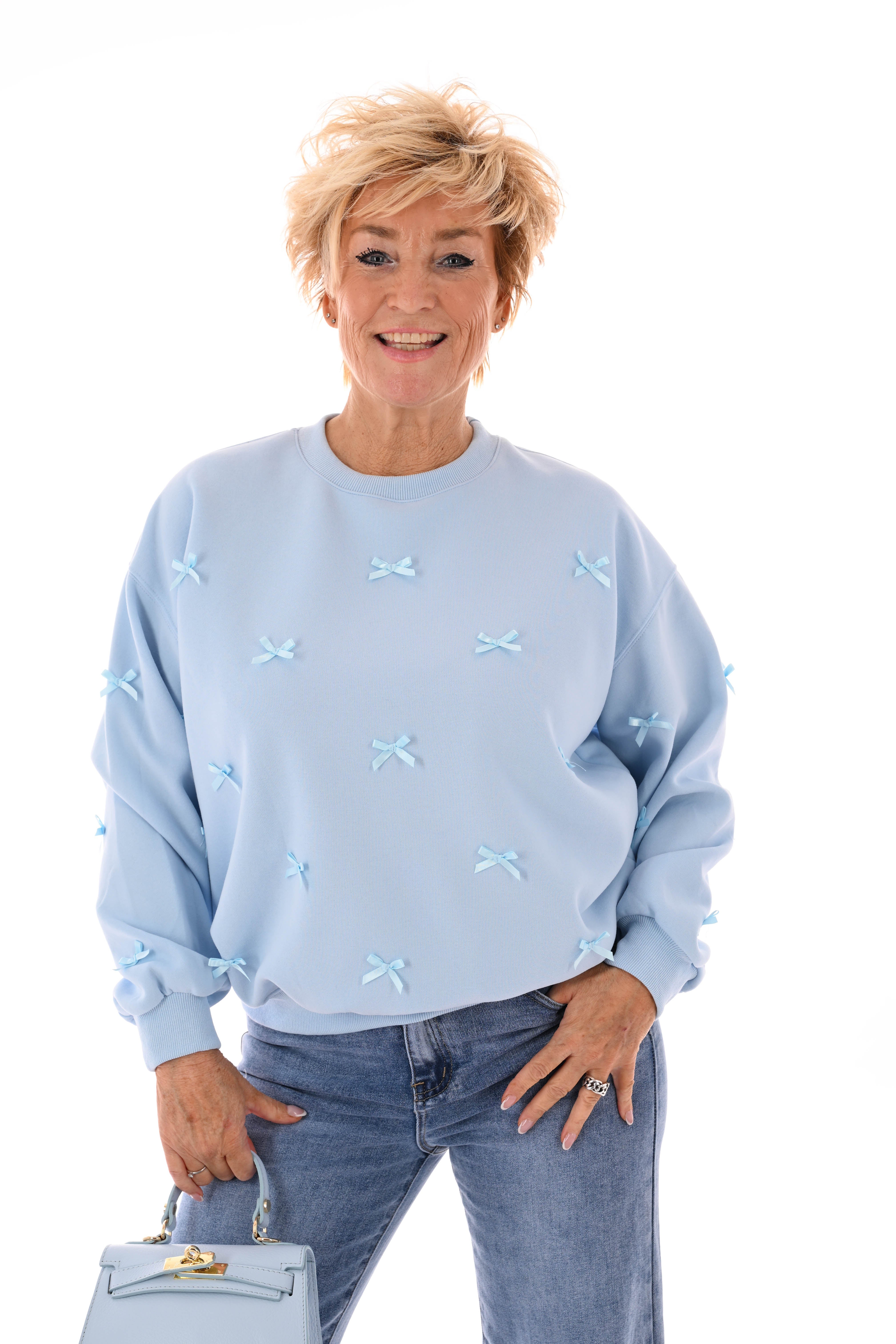 Sweater strikjes lichtblauw