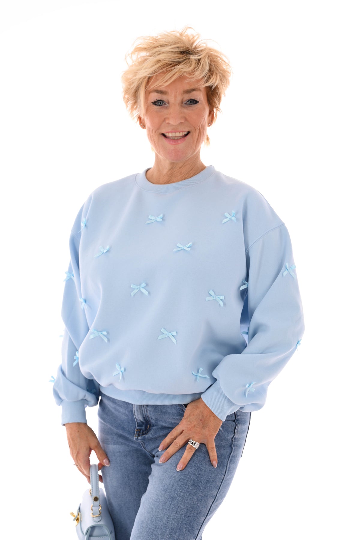 Sweater strikjes lichtblauw