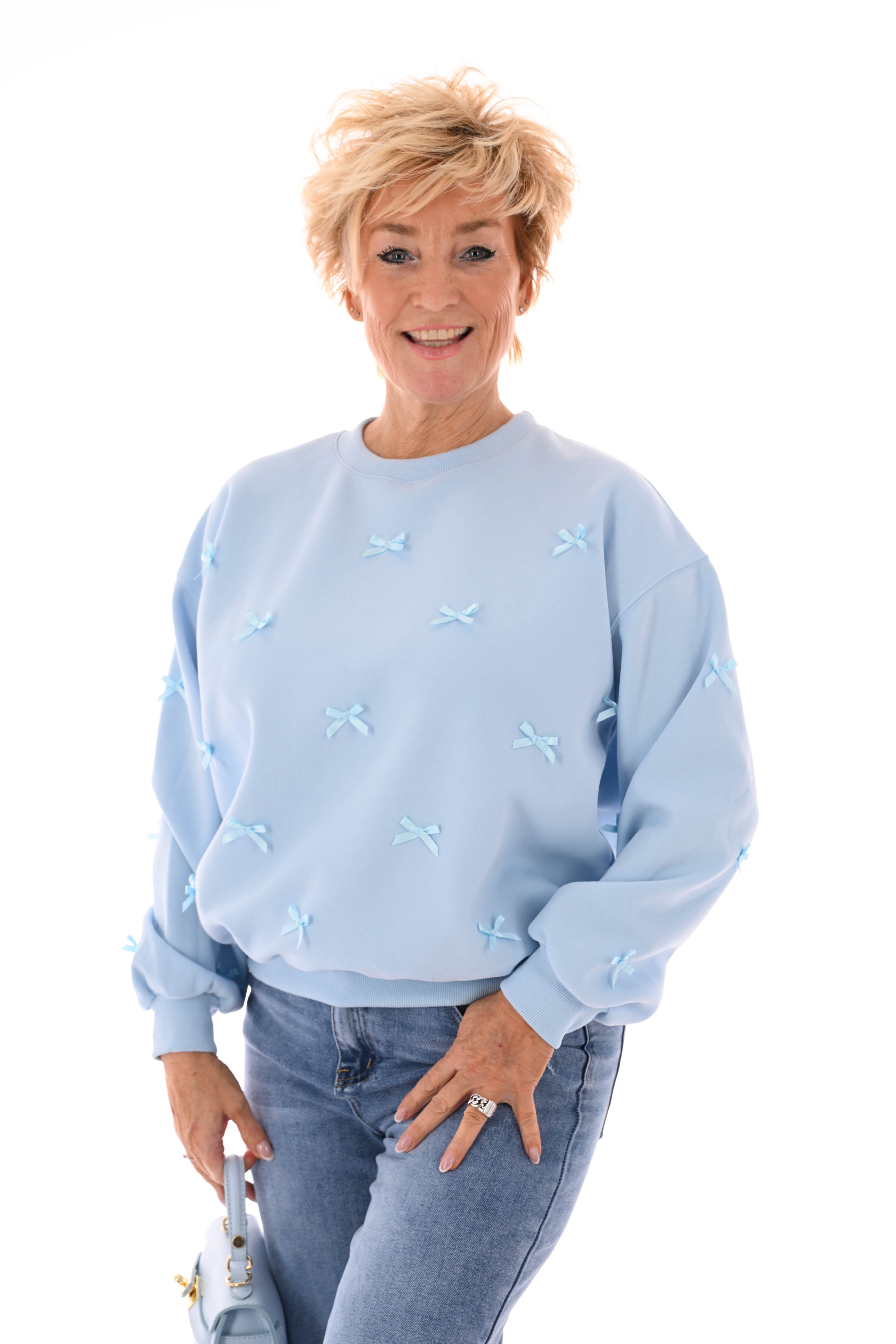 Sweater strikjes lichtblauw