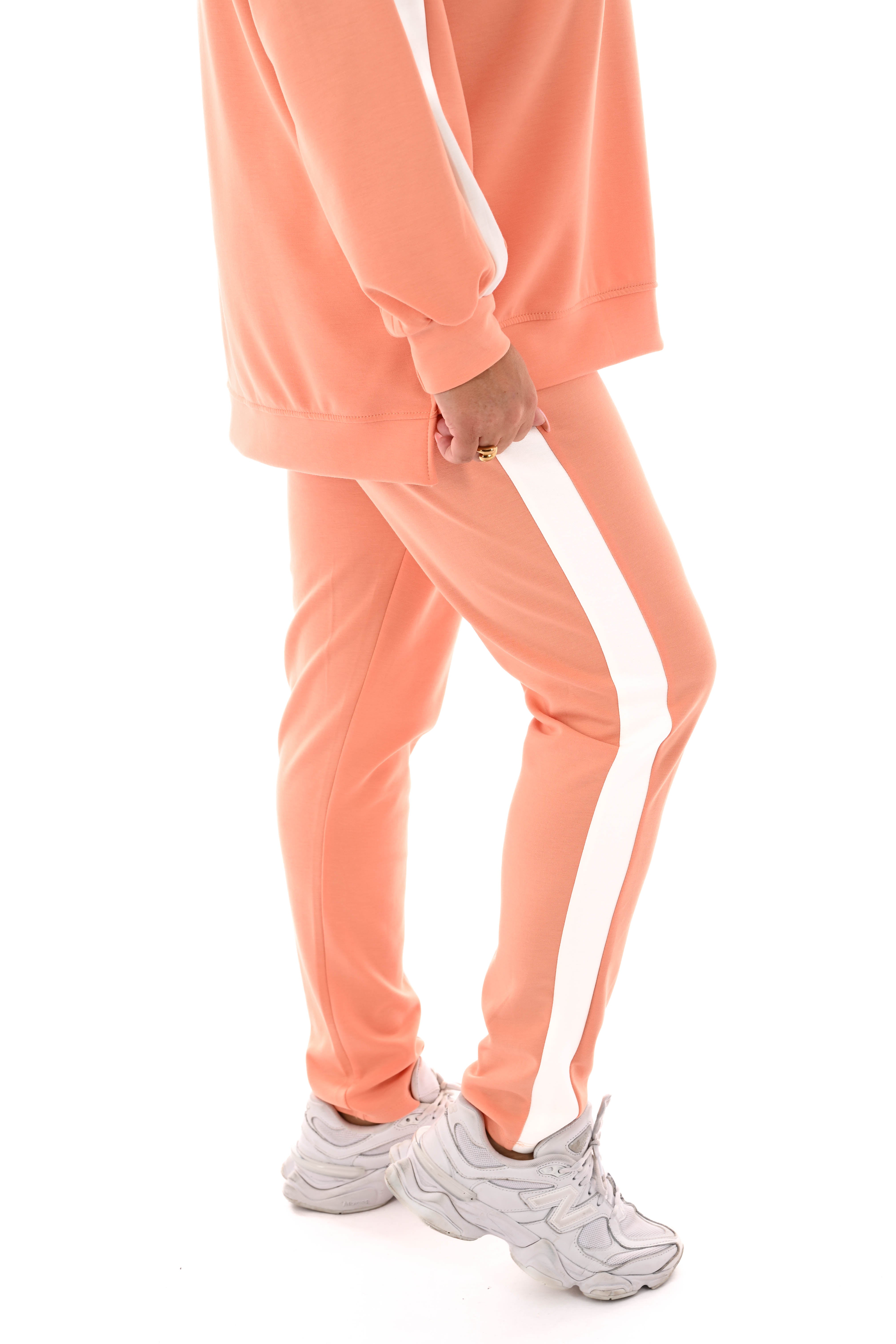 Tweedelig pak brede bies oranje