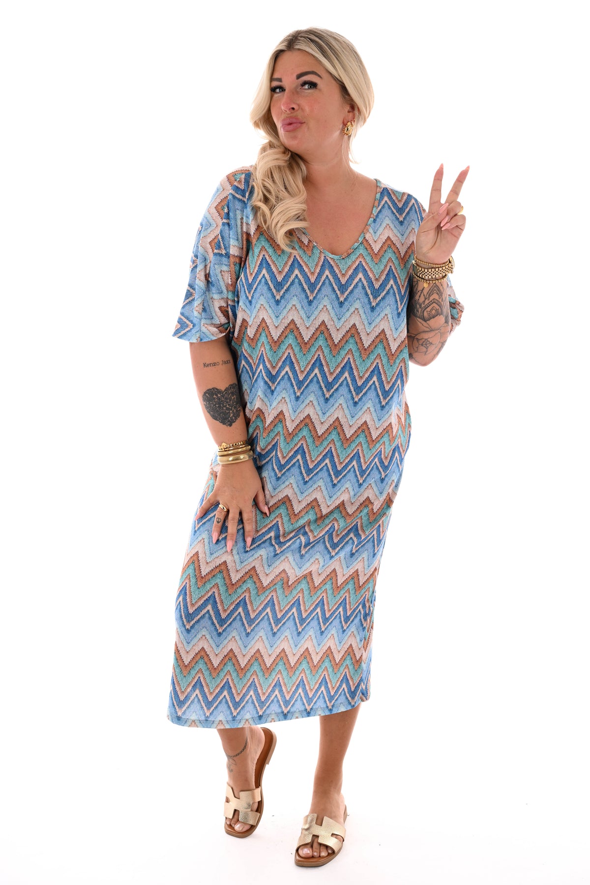 Jurk v-rug met strik zigzag lichtblauw/turquoise