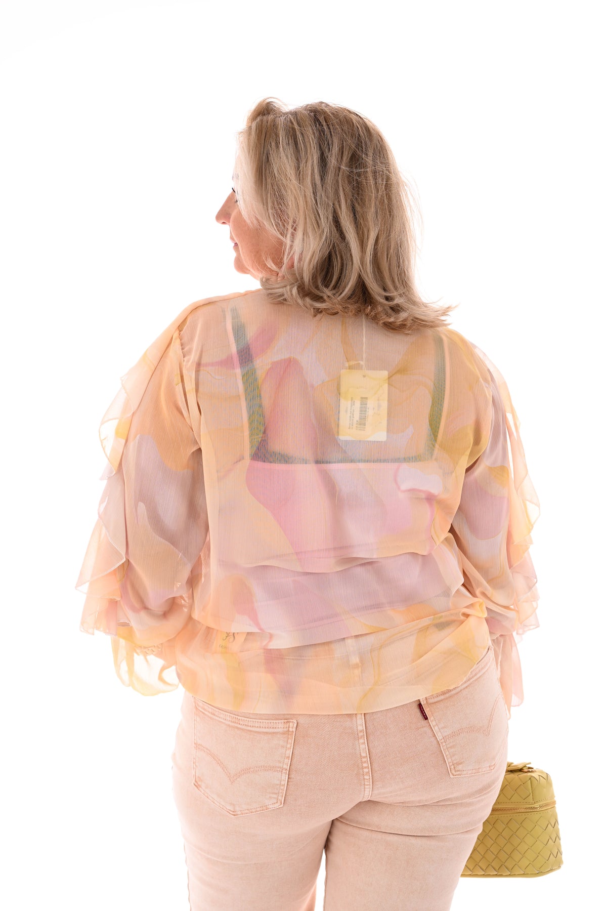 Blouse roezels met trompetmouwen abstract geel/roze