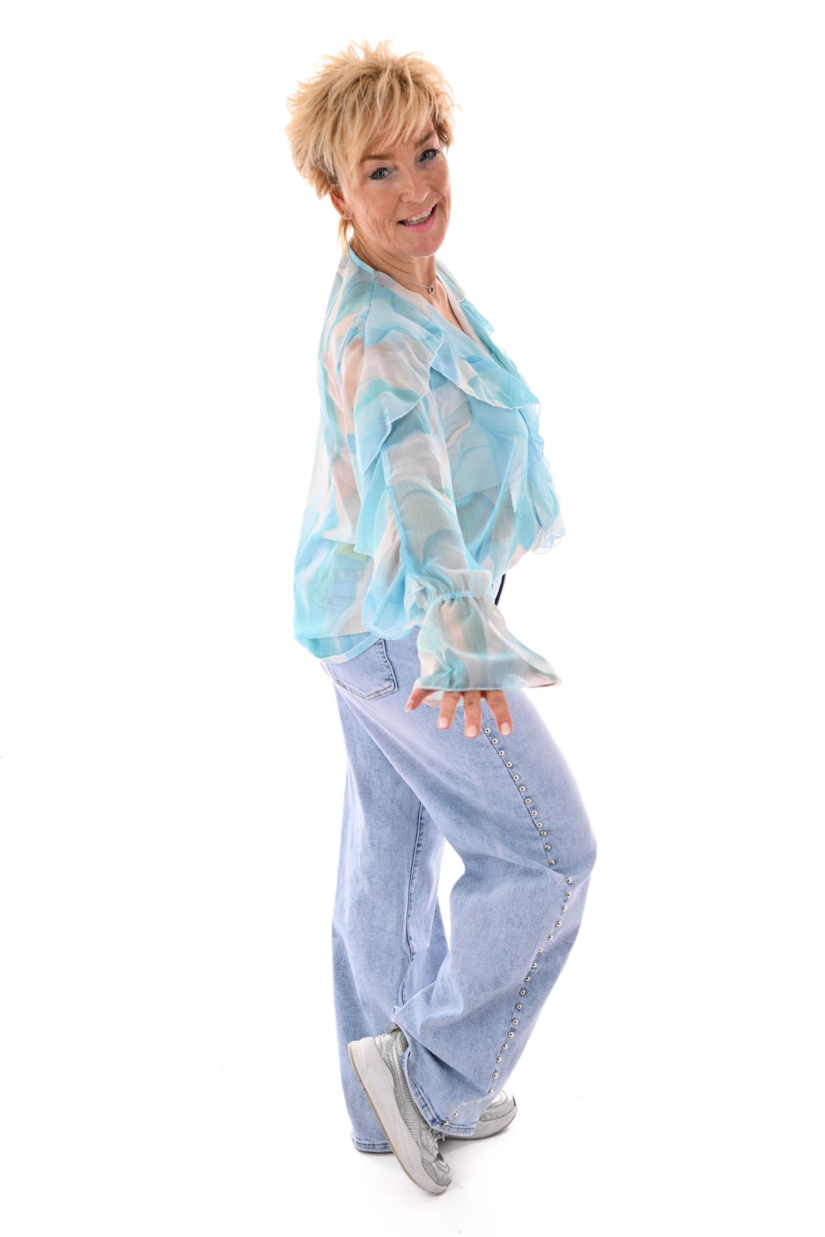 Blouse roezels met trompetmouwen abstract blauw/turquoise