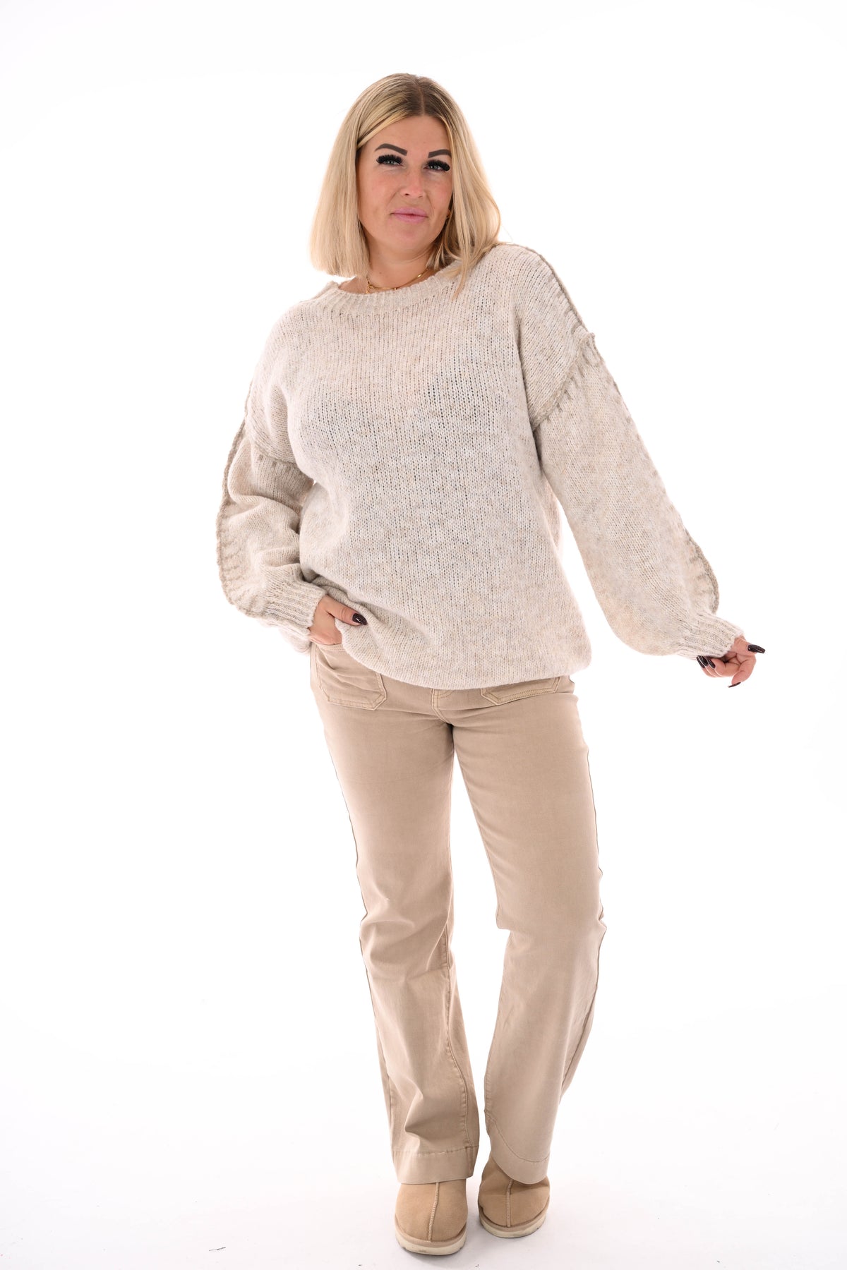 Gebreide trui met naaddetail beige