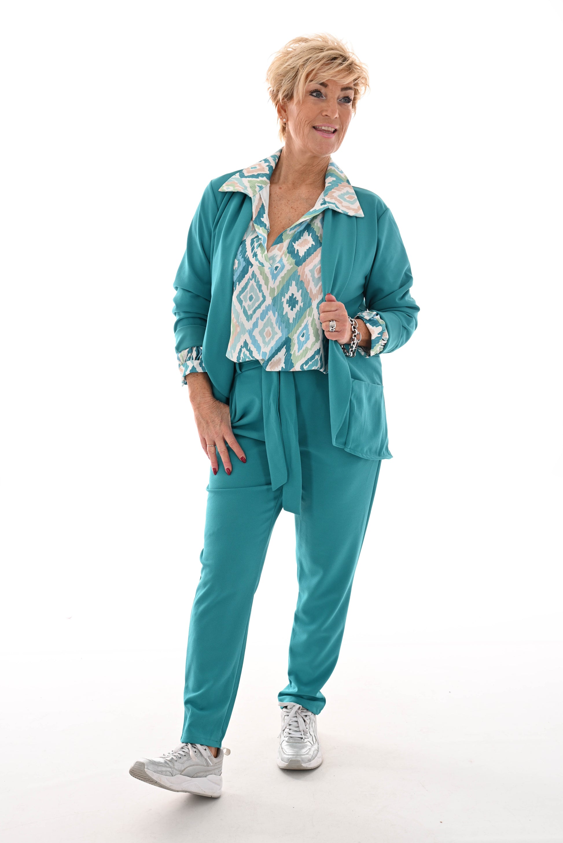 Tweedelig stretchpak met strik turquoise