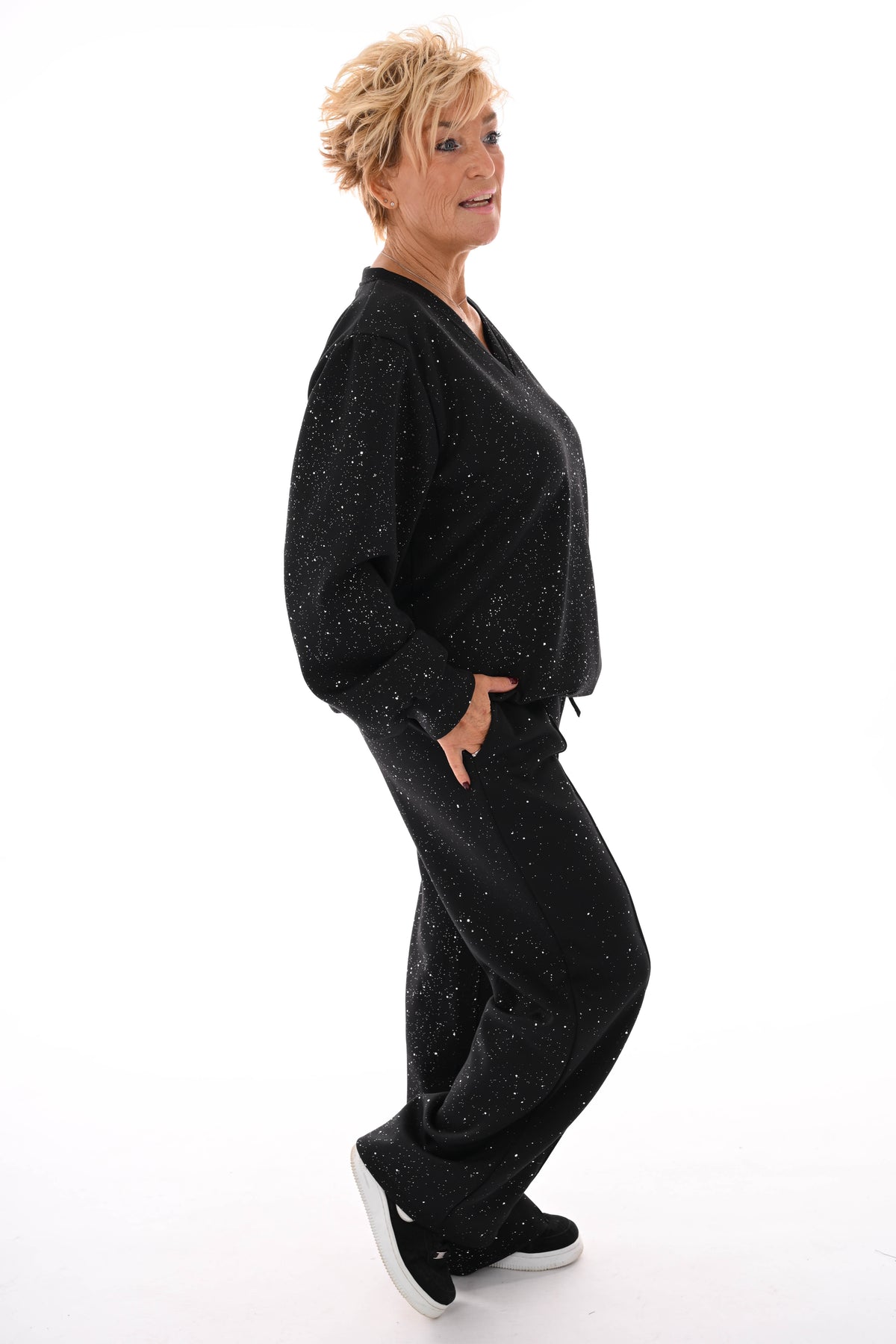 Tweedelig pak glitter flakes sweater v-hals zwart