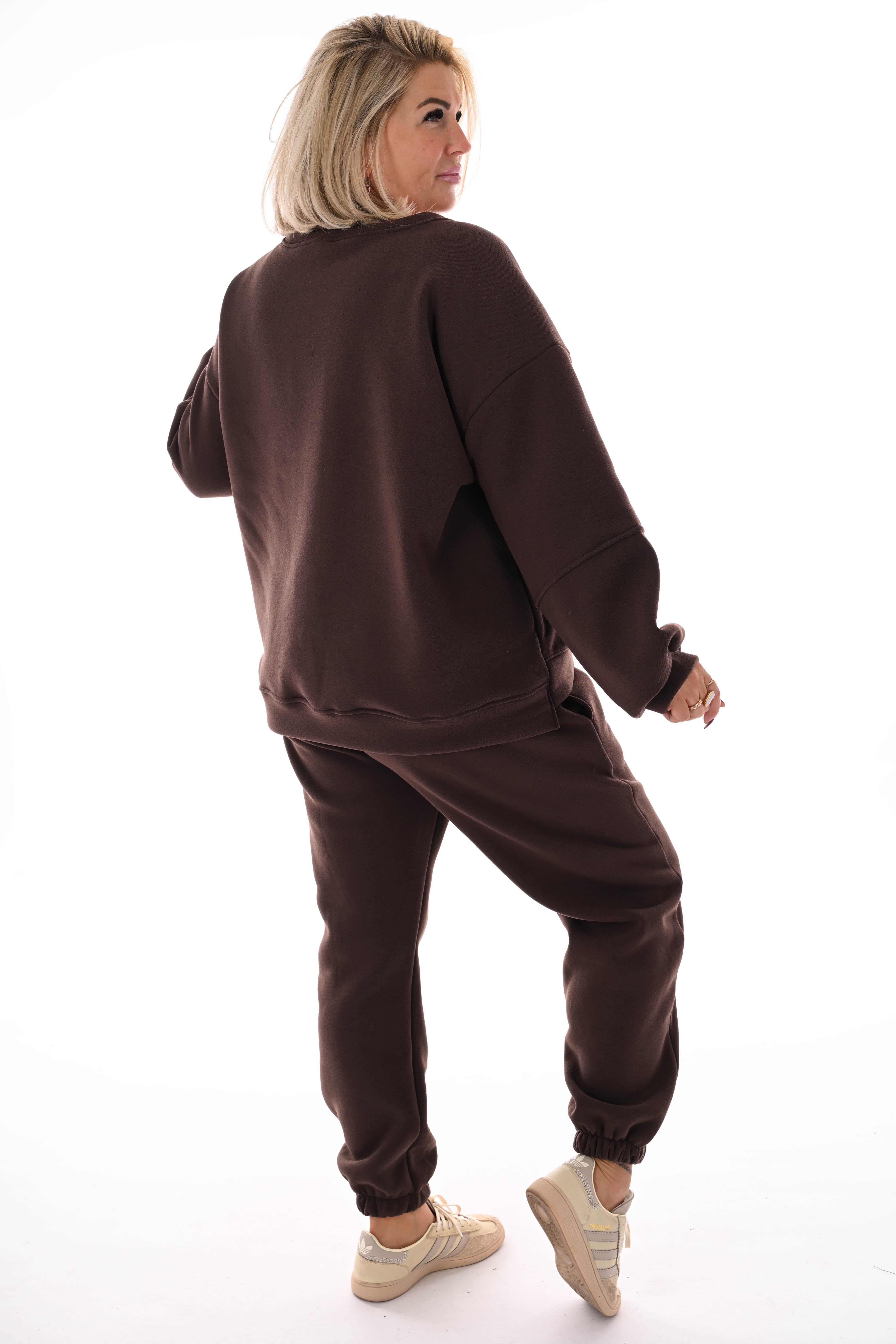 Tweedelig joggingspak applicatie bruin