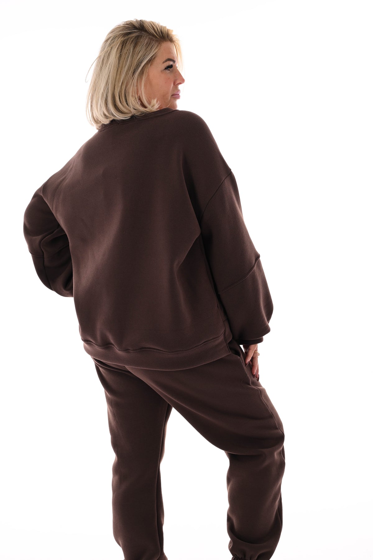 Tweedelig joggingspak applicatie bruin