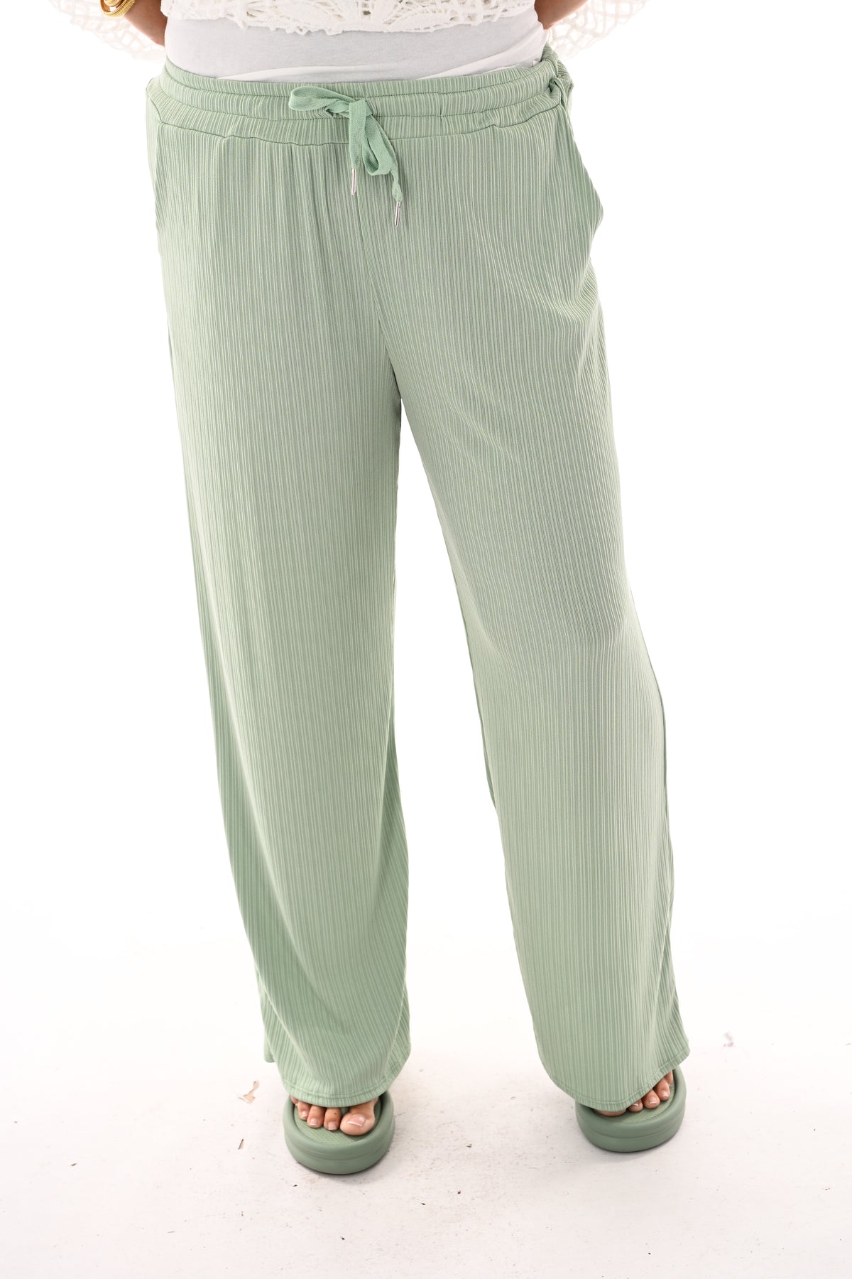 Broek smalle plooien lindegroen