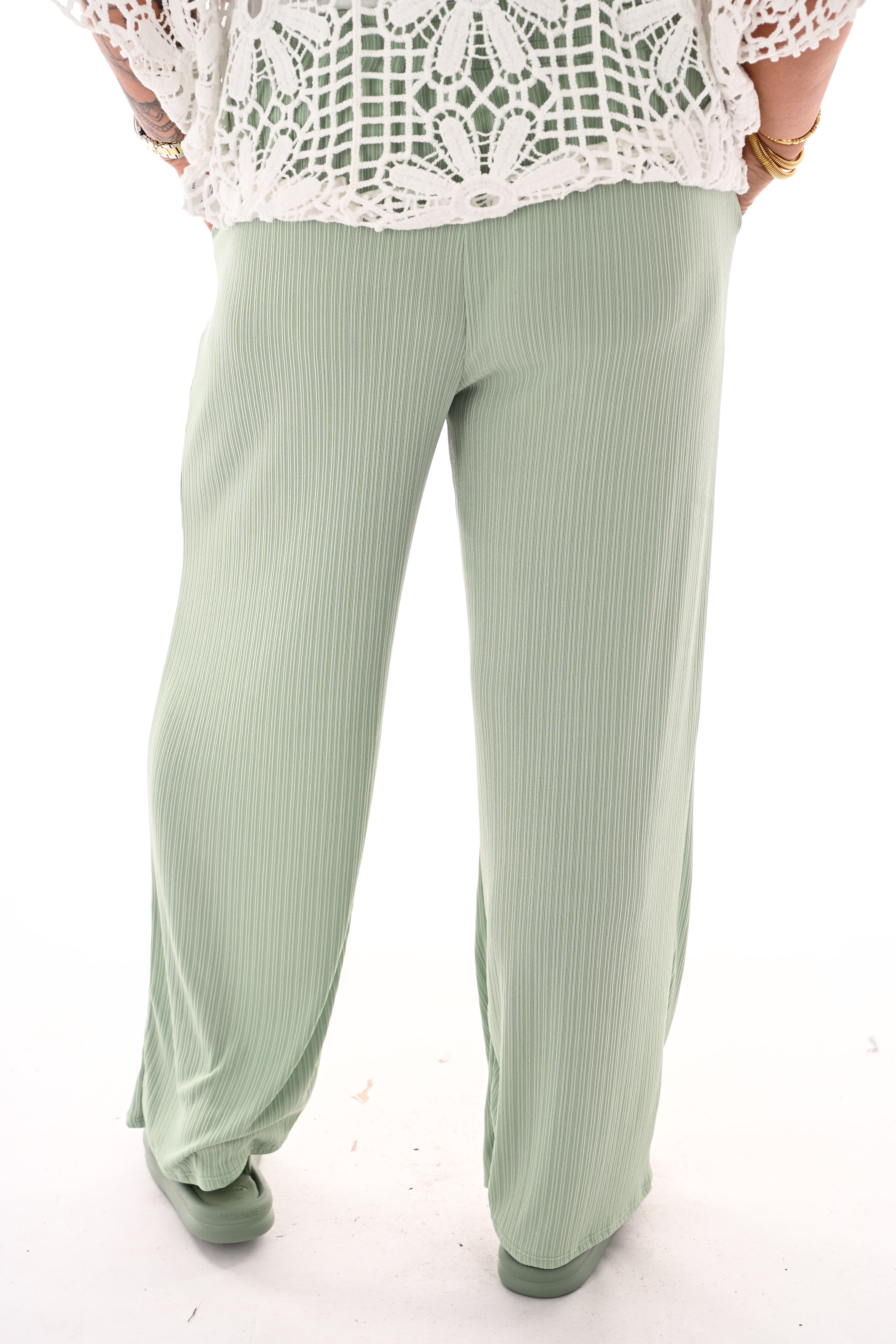 Broek smalle plooien lindegroen