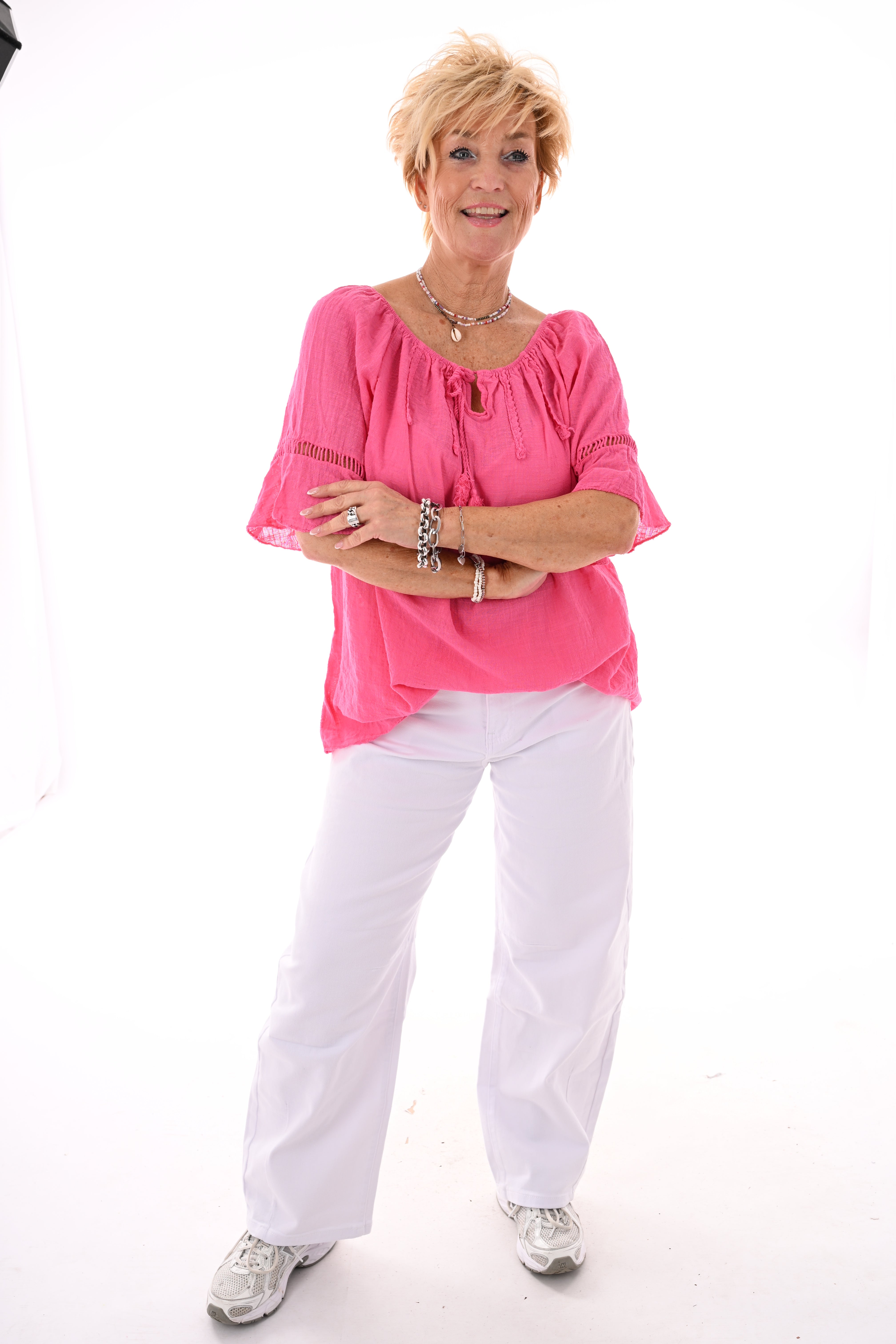 Top ibiza met kwastjes fuchsia